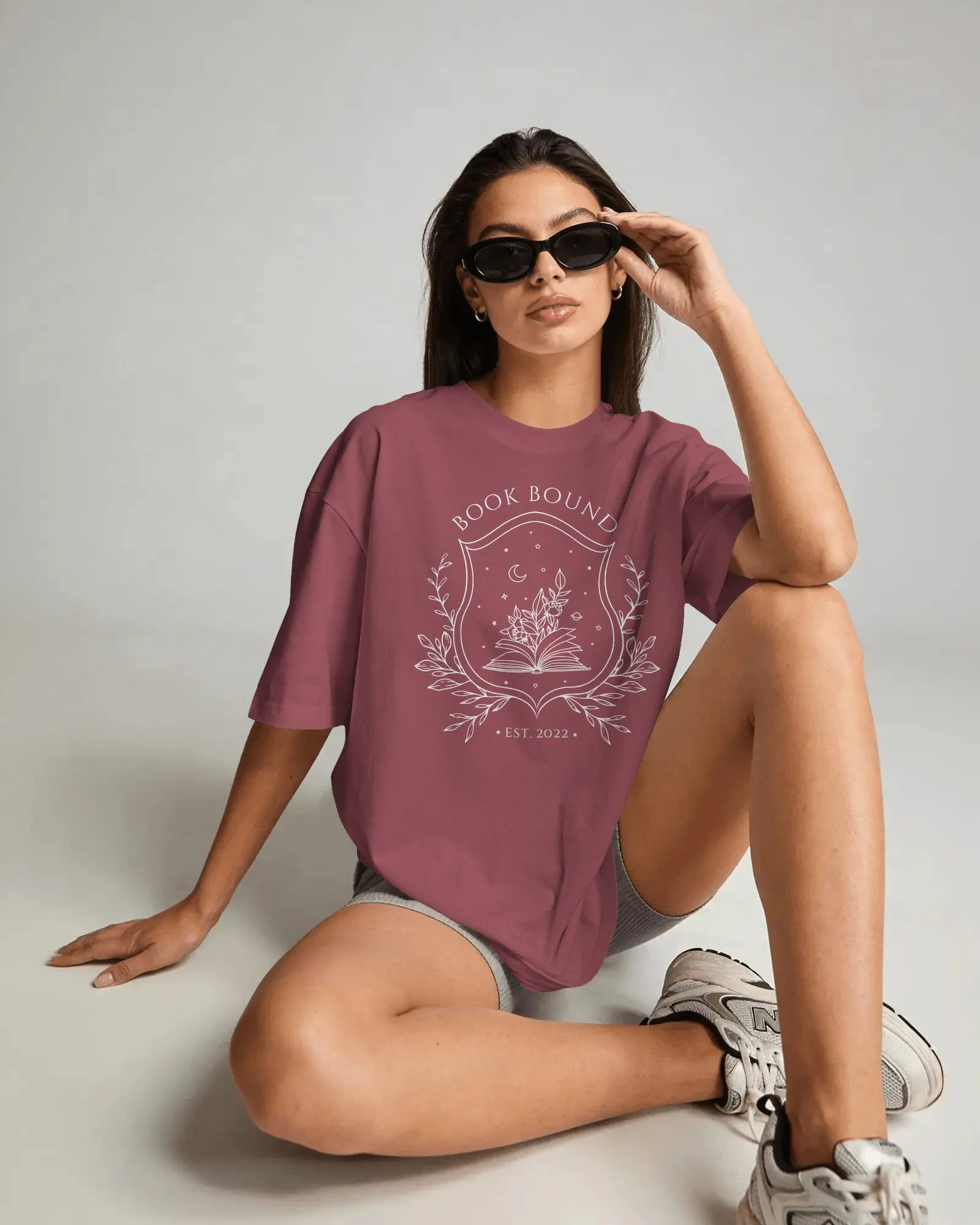 amazon-tshirt-mockup-female-model-sitting-on-studio-floor-wearing-sunglasses-with-casual-fashion-04063 copy.jpg