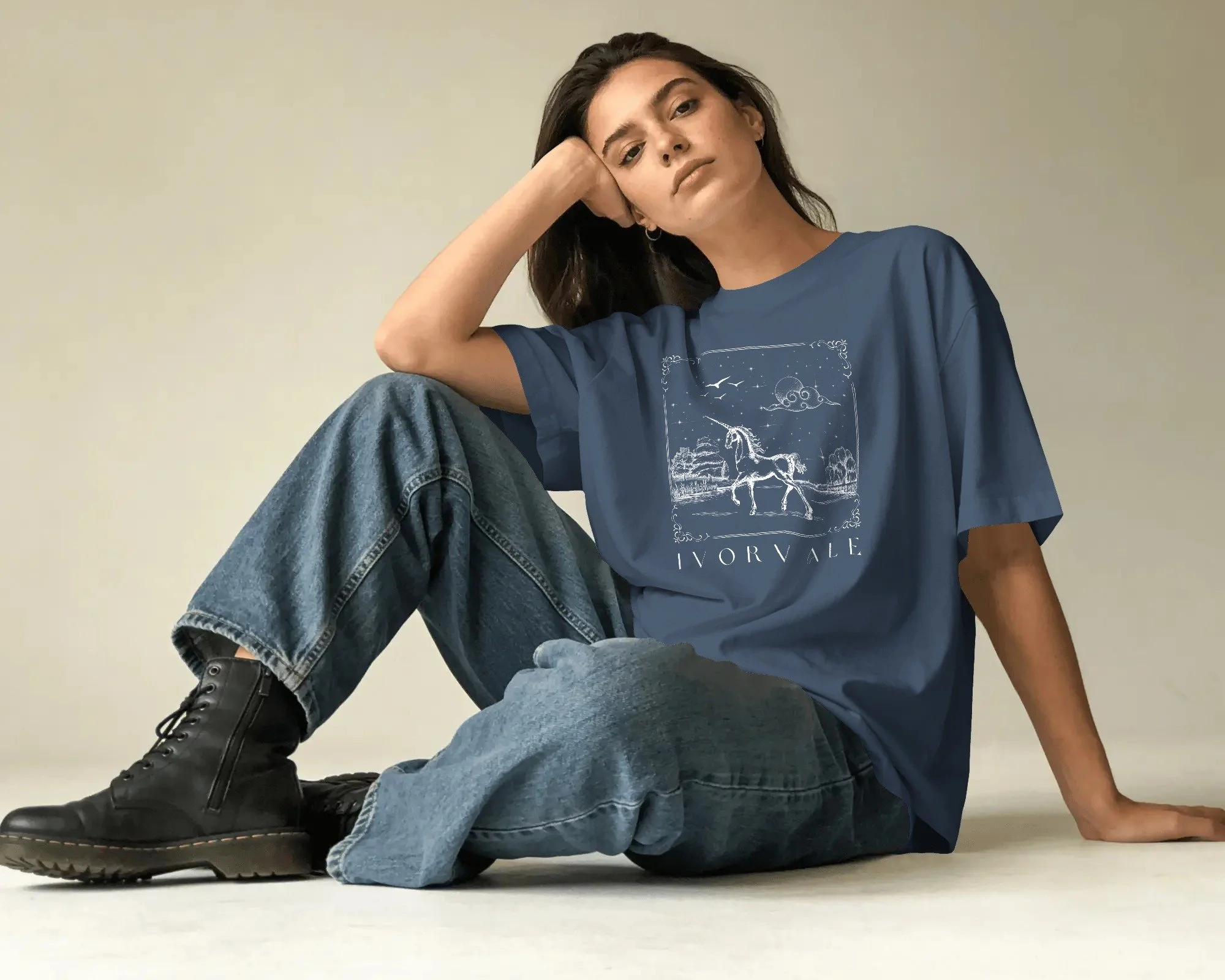 relaxed-lifestyle-t-shirt-mockup-female-model-sitting-floor-hand-on-head-soft-lighting-03919.jpg