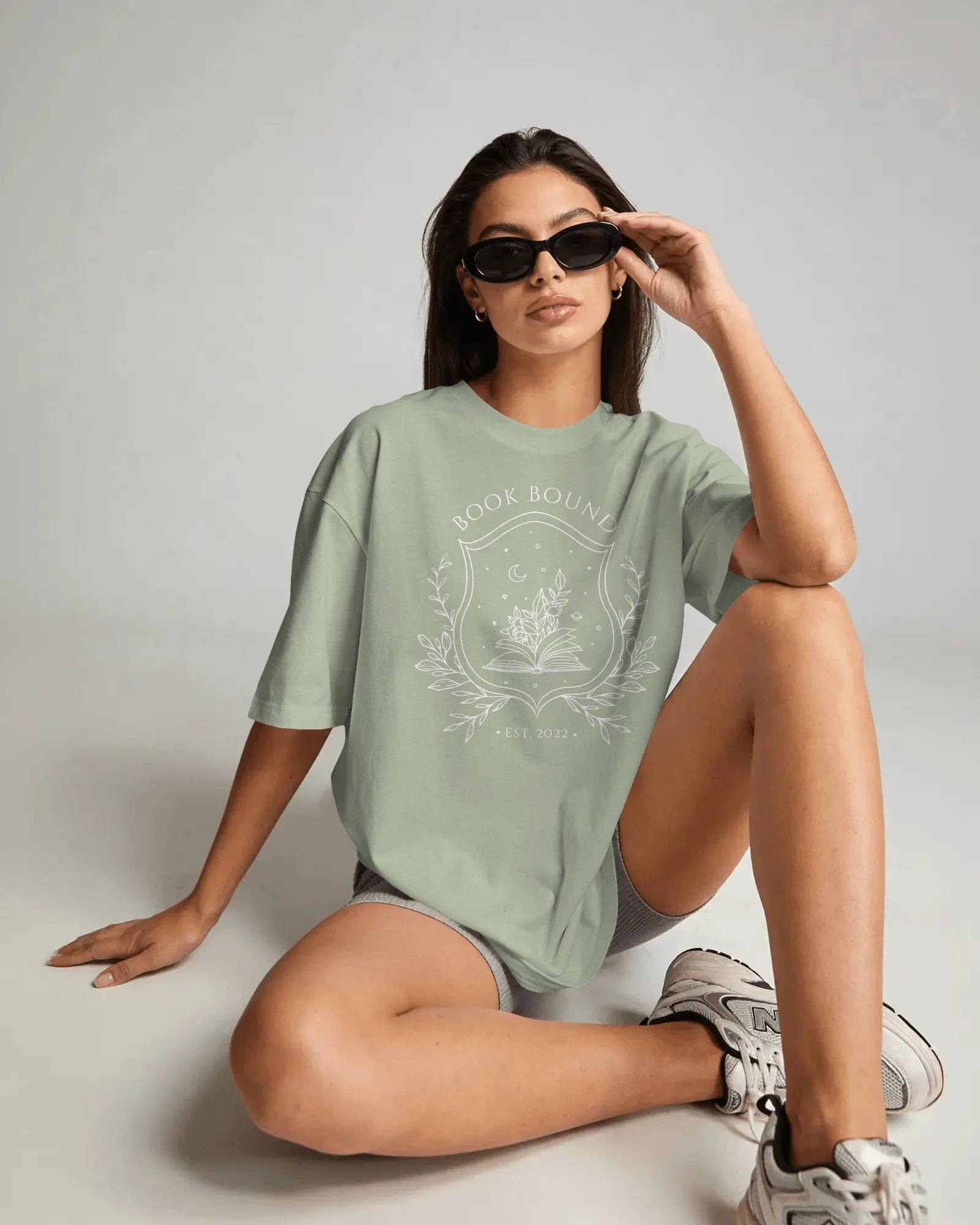 amazon-tshirt-mockup-female-model-sitting-on-studio-floor-wearing-sunglasses-with-casual-fashion-04063 copy 5.jpg