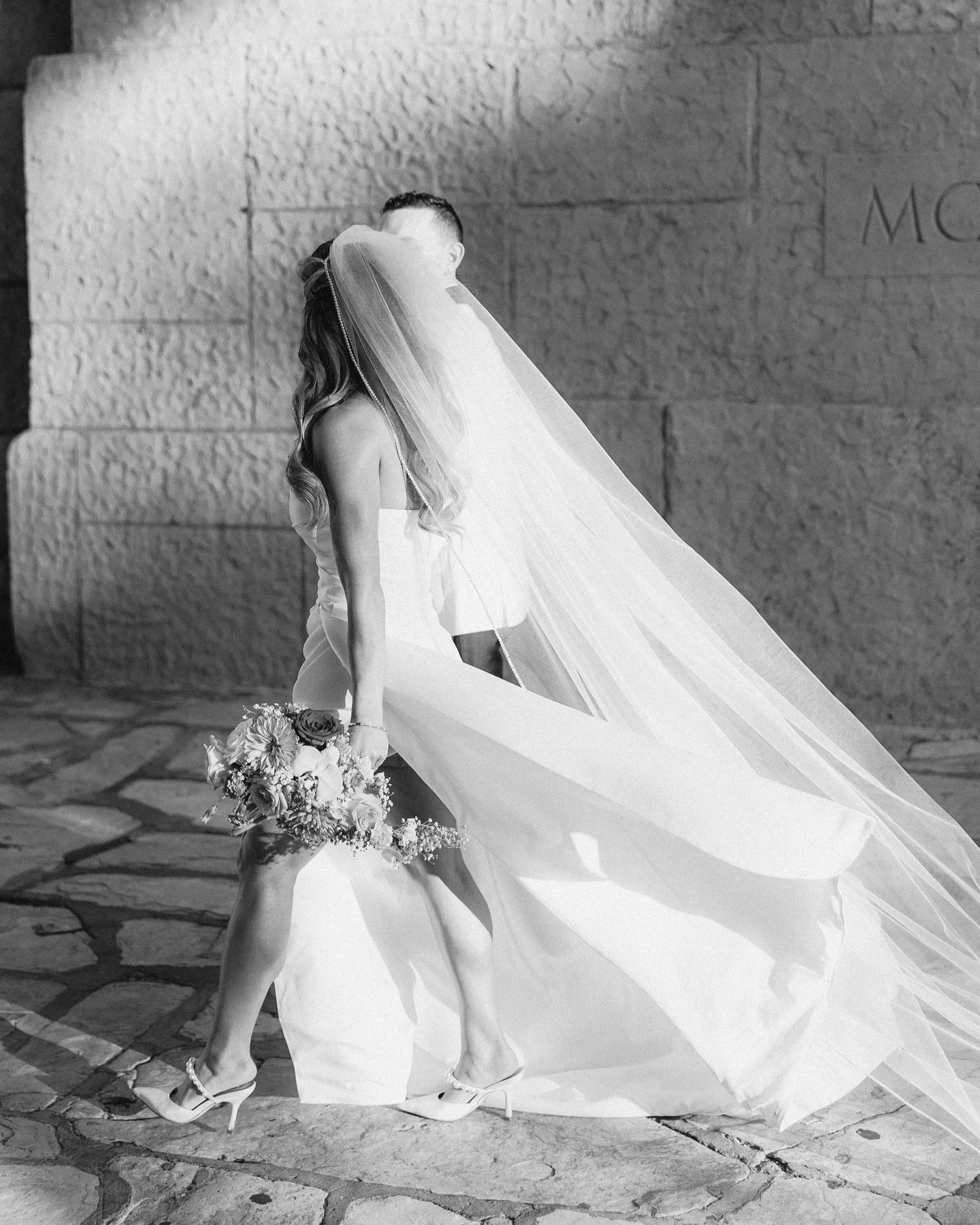 Some of my favorite wedding photos are the ones no one sees coming.
Like the second-third frame in this carousel &mdash; completely unprompted, taken as we were simply walking back to the car after portraits. No posing, no directing&hellip; just a bu