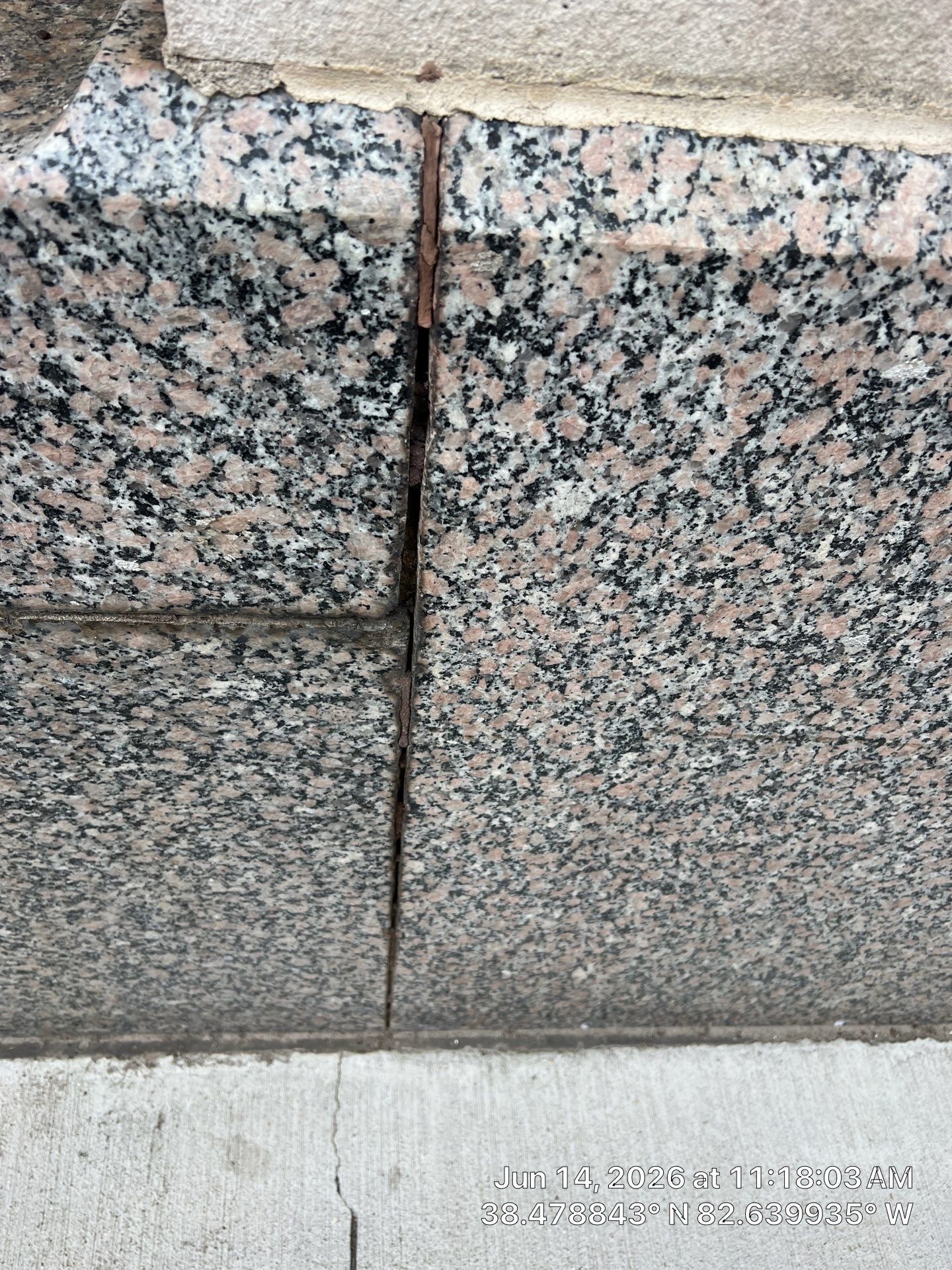 Failed sealant at granite panel joints on a downtown Ashland, KY commercial building before recaulking.jpg