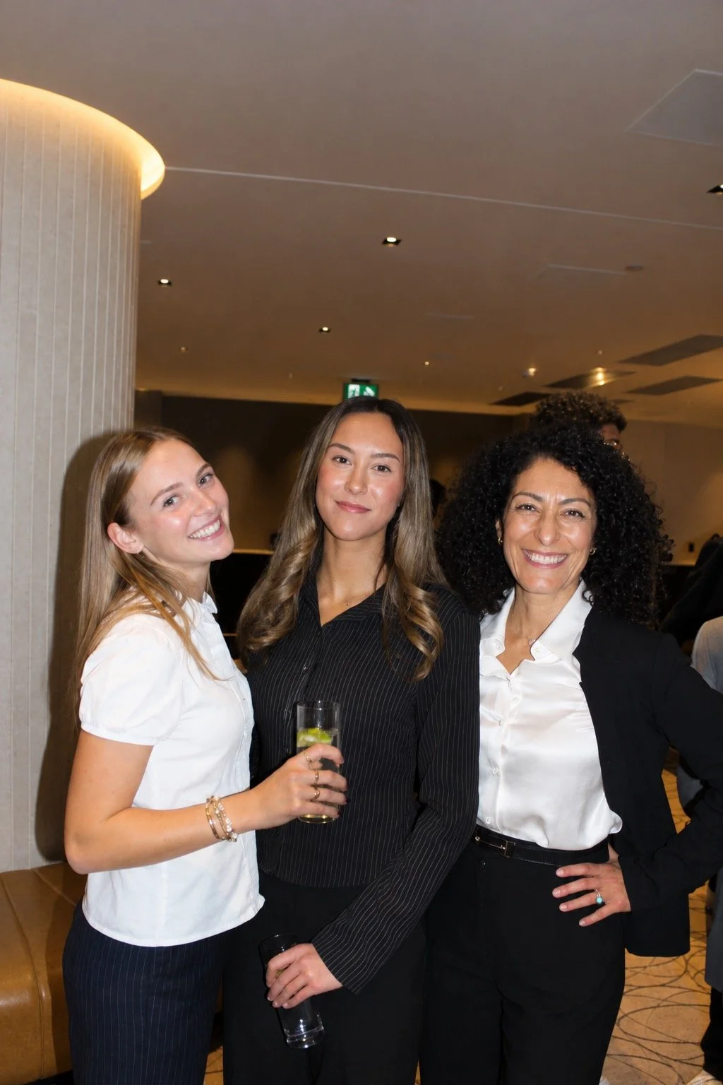 Three Women at a Networking Reception.jpeg