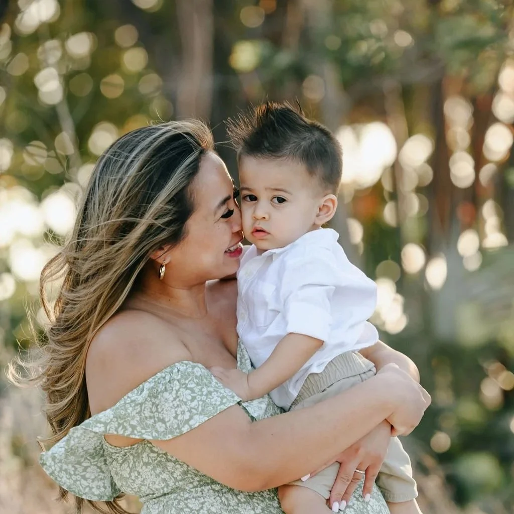 Parent and child moment during a family session in Grand Cayman