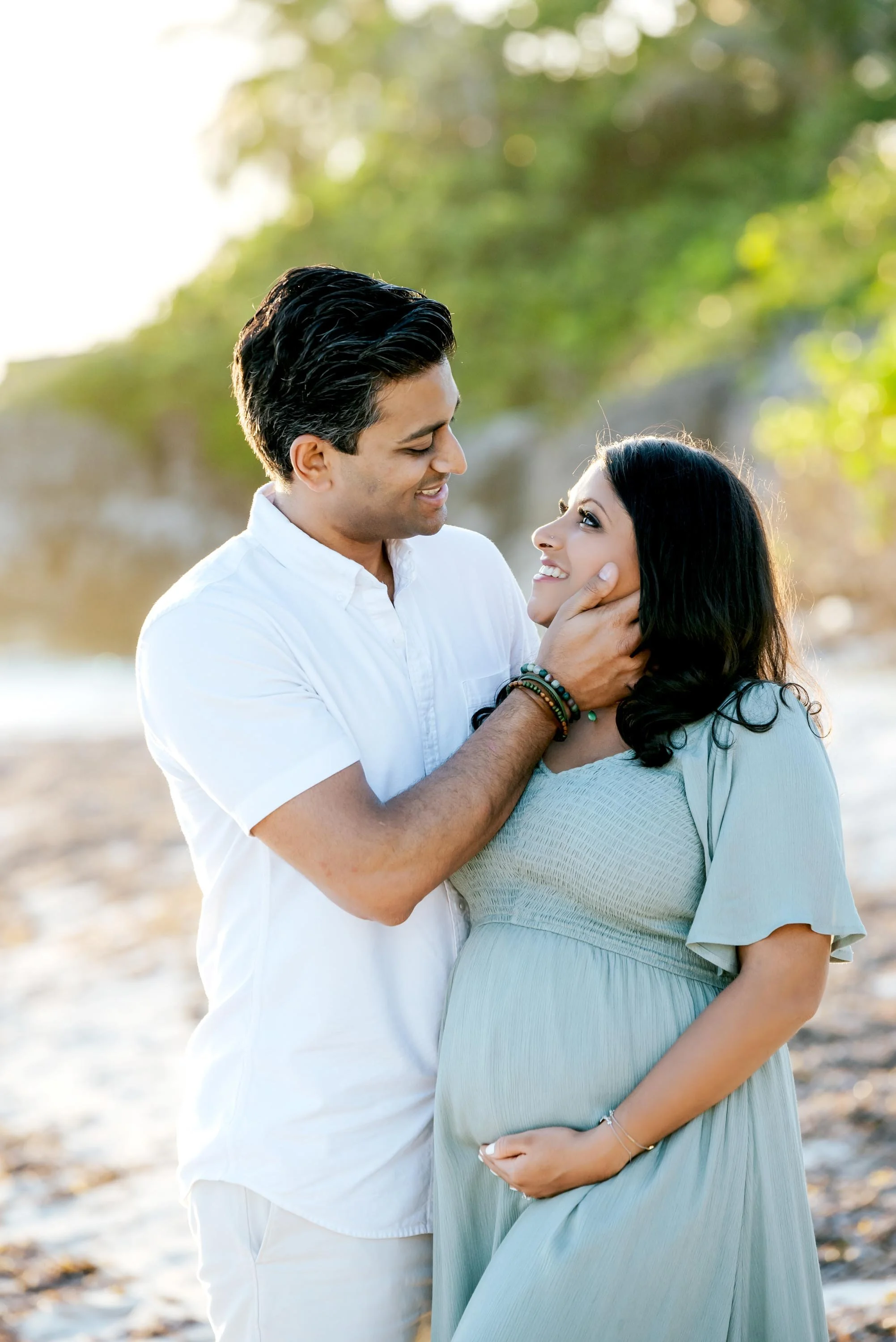 Portrait of couple during babymoon in the Cayman Islands.jpeg