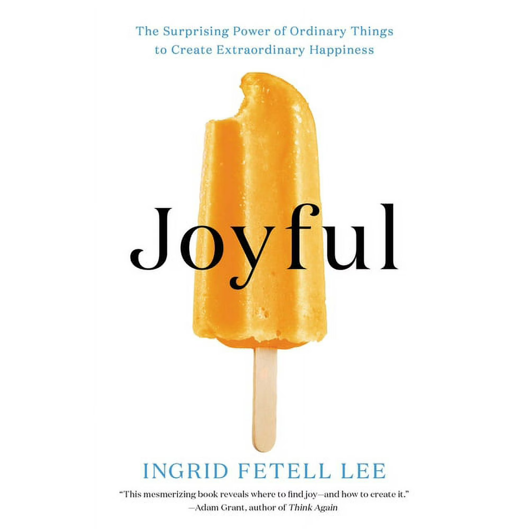 Cover of the book Joyful by Ingrid Fetell Lee featuring a yellow popsicle with a bite taken out of it on a white background.