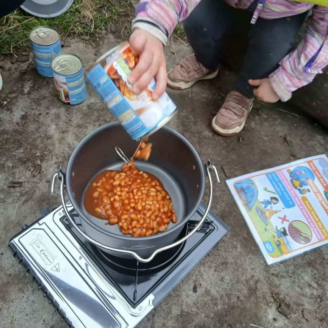 The Discovery group cooked their own Tea today! The children cooked their beans on the campfire and buttered their own toast, lovely comments from the children too. &quot;This is so much fun. &quot;.....😋 🫘🍽🍞 #camplife #firepit🔥 #camping #cookin