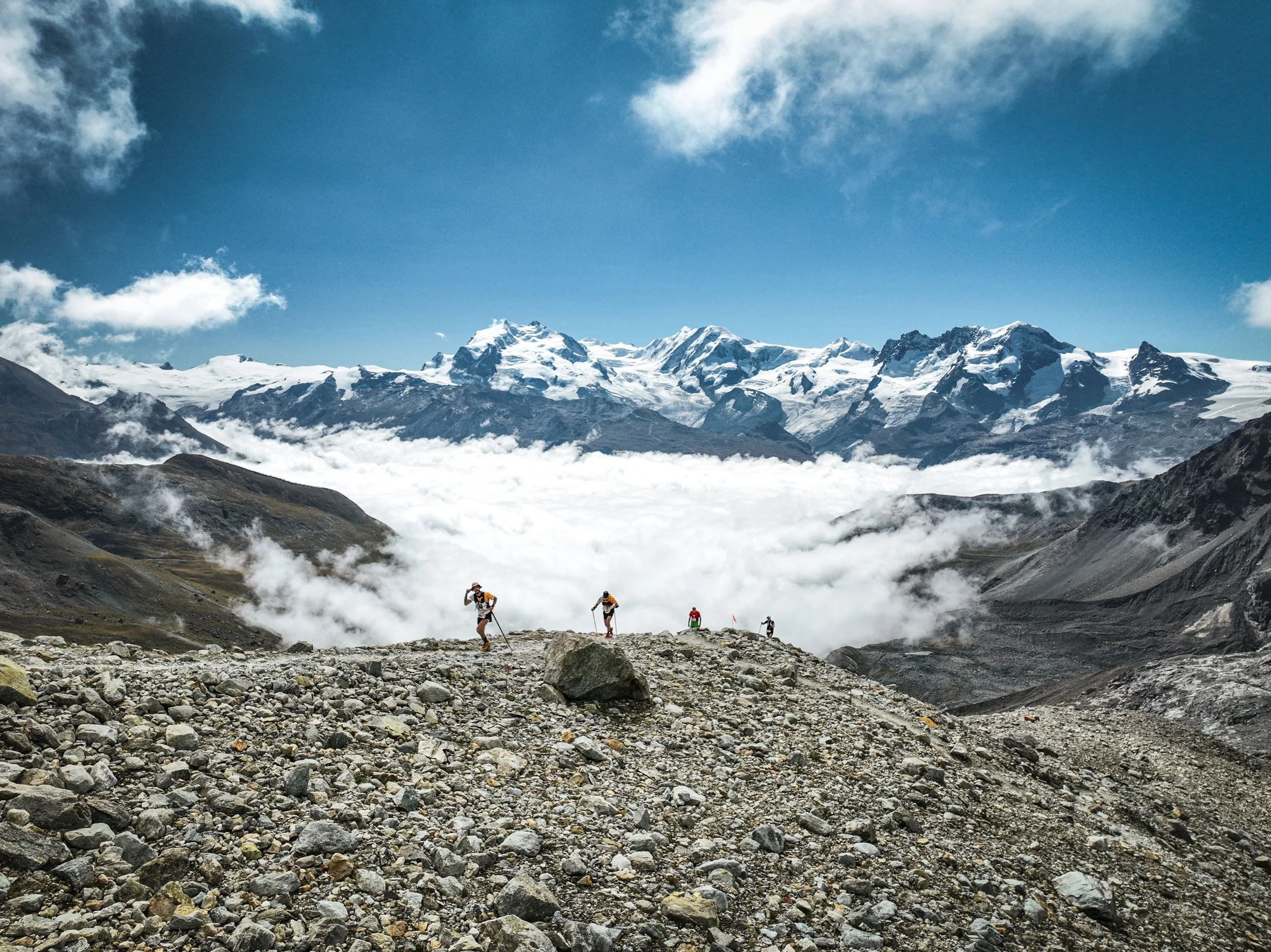 panorama of monte rosa massif with trail runners in the foreground during materhorn ultraks 2025