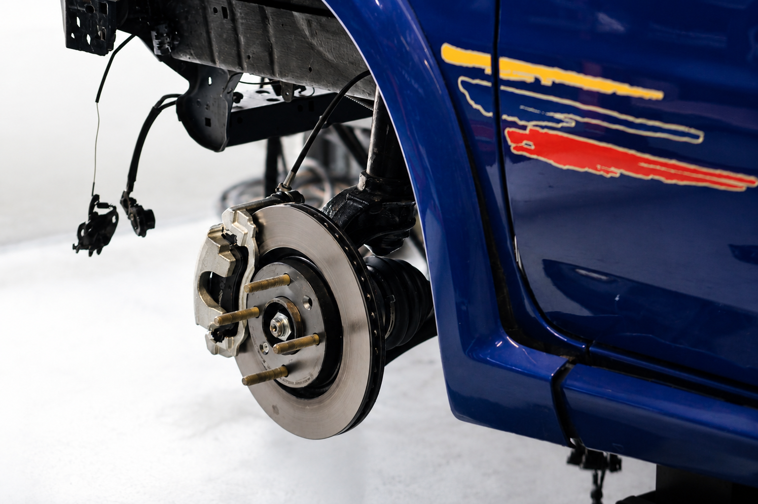 Refurbished front end, with extended wheel stud kit, so he can pick and choose wheel and spacers combinations.