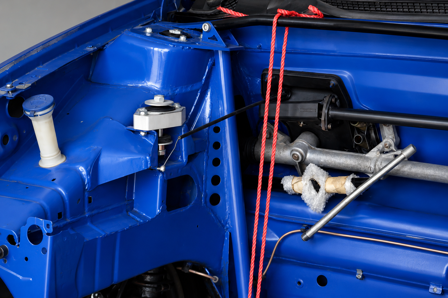 Satchell front end strengthening kit, and race spec engine mounts on show. 
