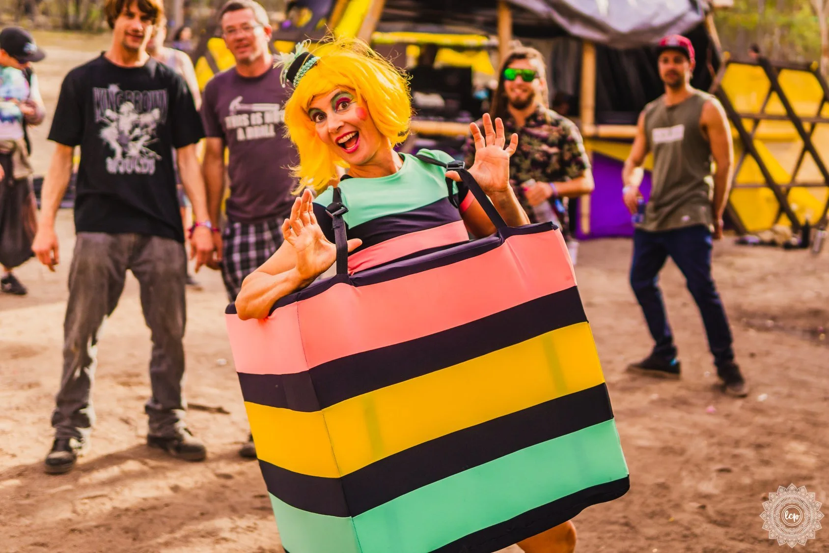 Bright striped liquorice costume performers creating fun, eye-catching entertainment at Gold Coast event