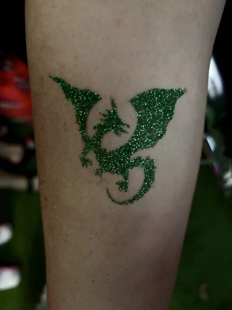 Fun glitter tattoo entertainment for community days and outdoor events on the Gold Coast.