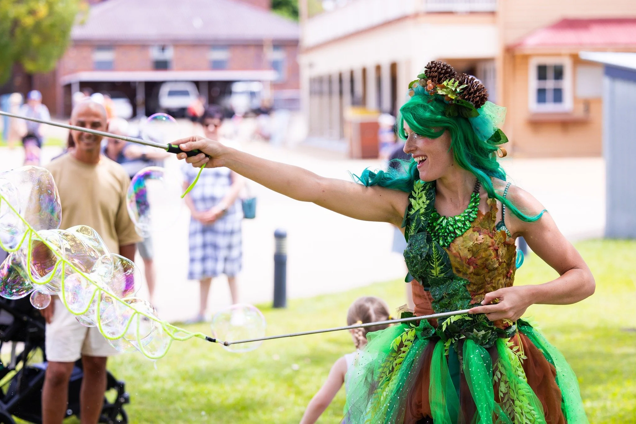 Green fairy making bubbles Brisbane
