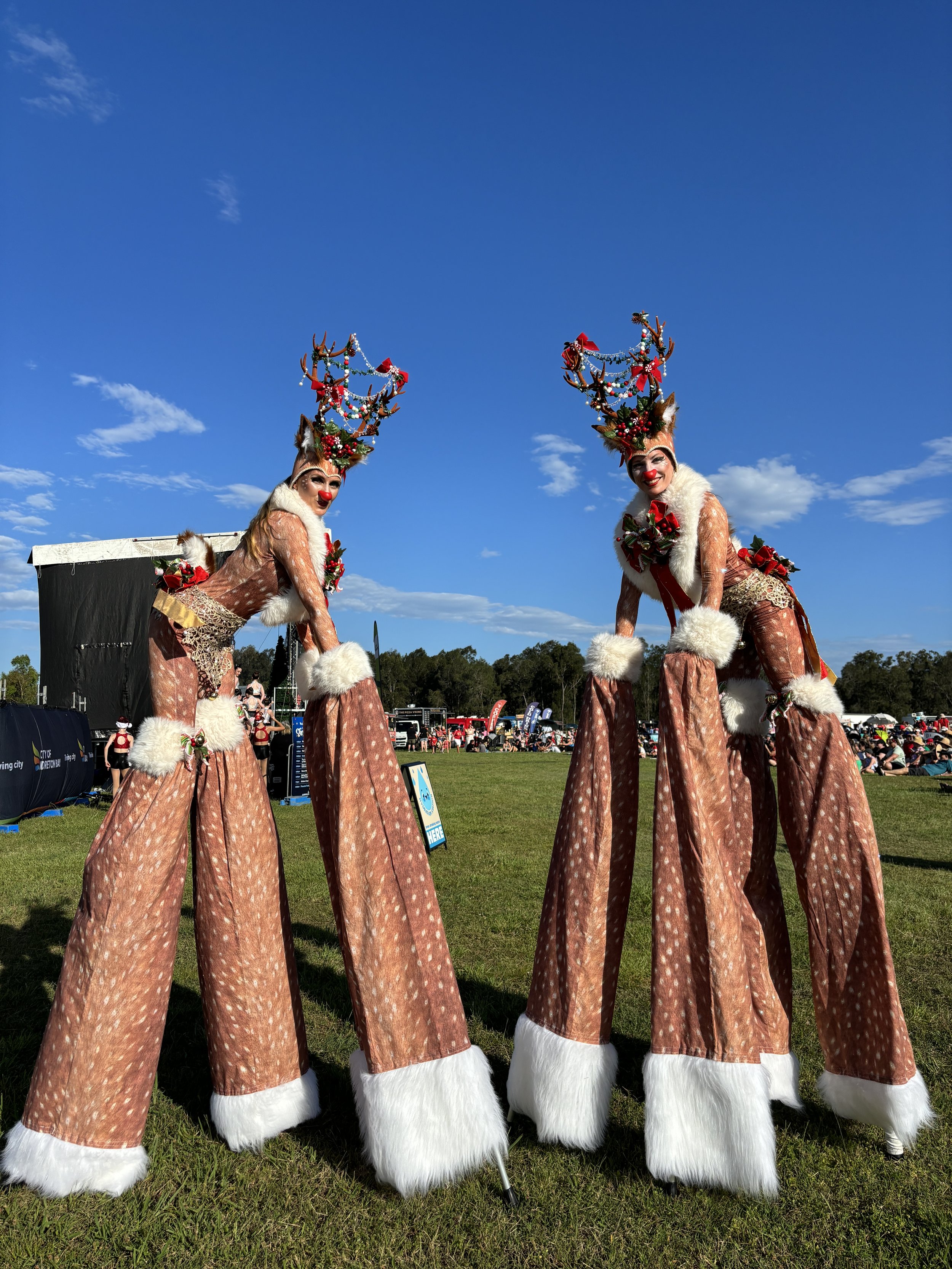 Christmas stilt walkers reindeers characters Eyes Up Events roving entertainment Brisbane