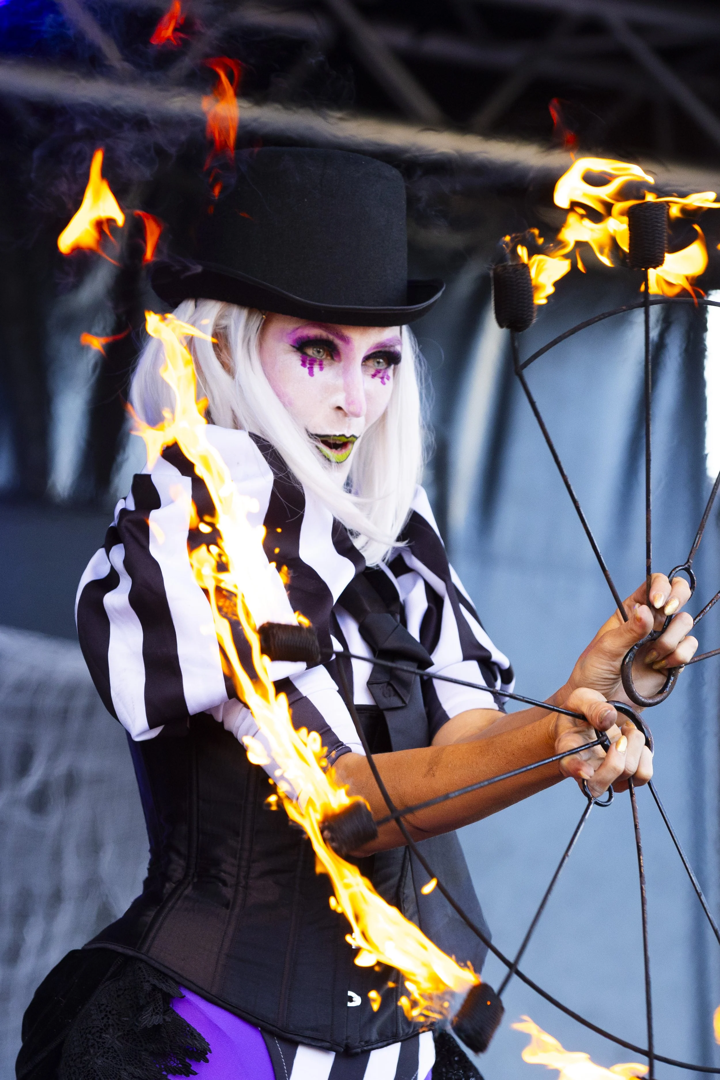 Spooky fire show character entertaining a festival crowd in Brisbane