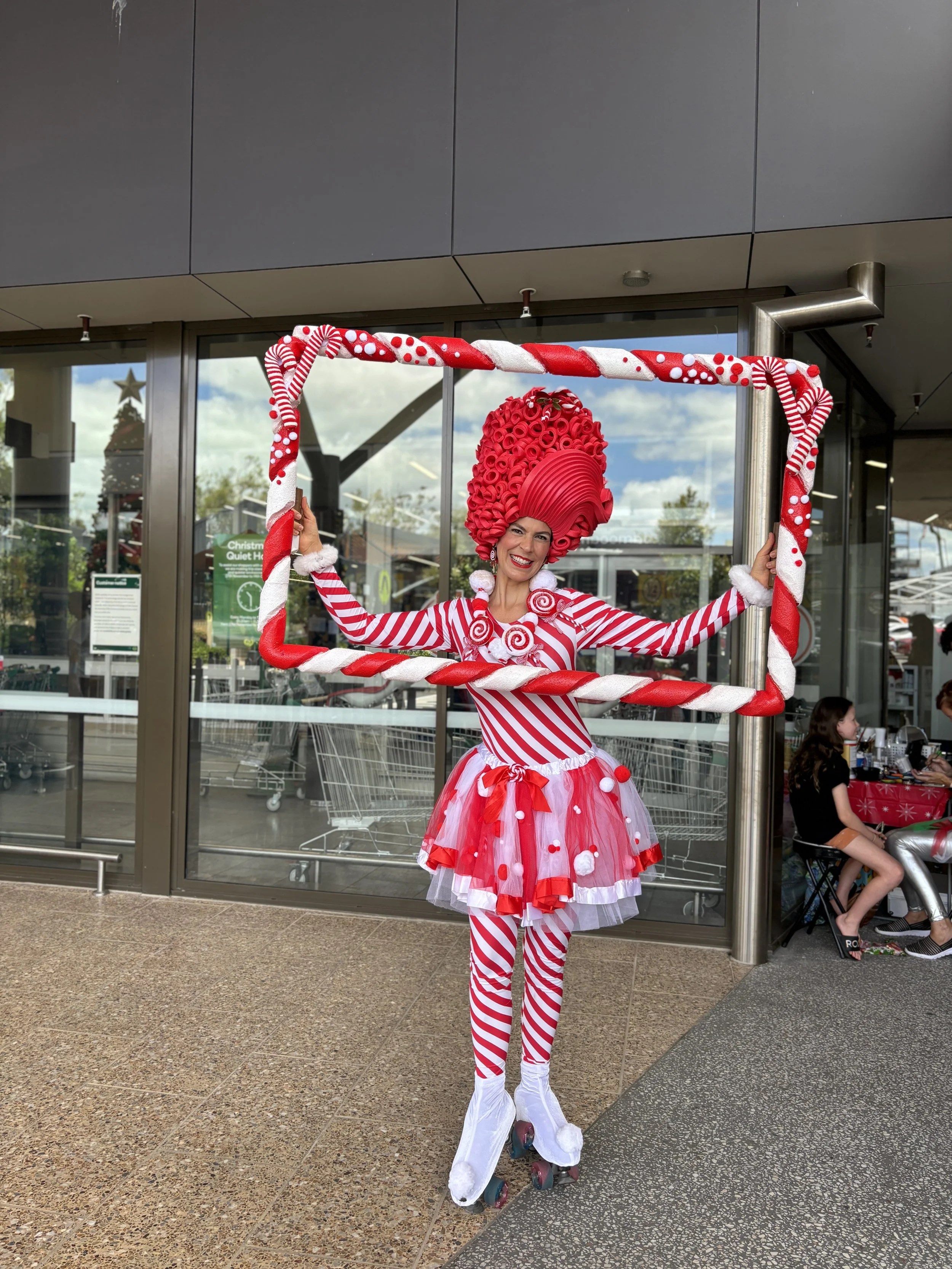 Christmas candy cane rollerskating event entertainment, roaming performer, Brisbane