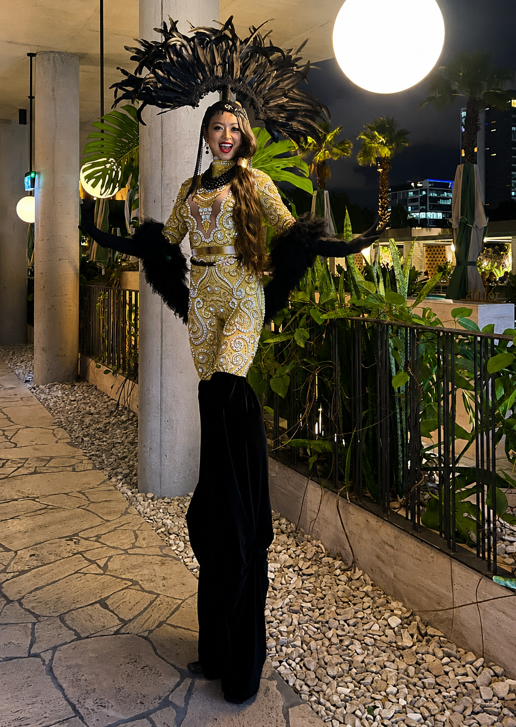 Roving feather showgirl entertainer at a glamorous Brisbane corporate function.