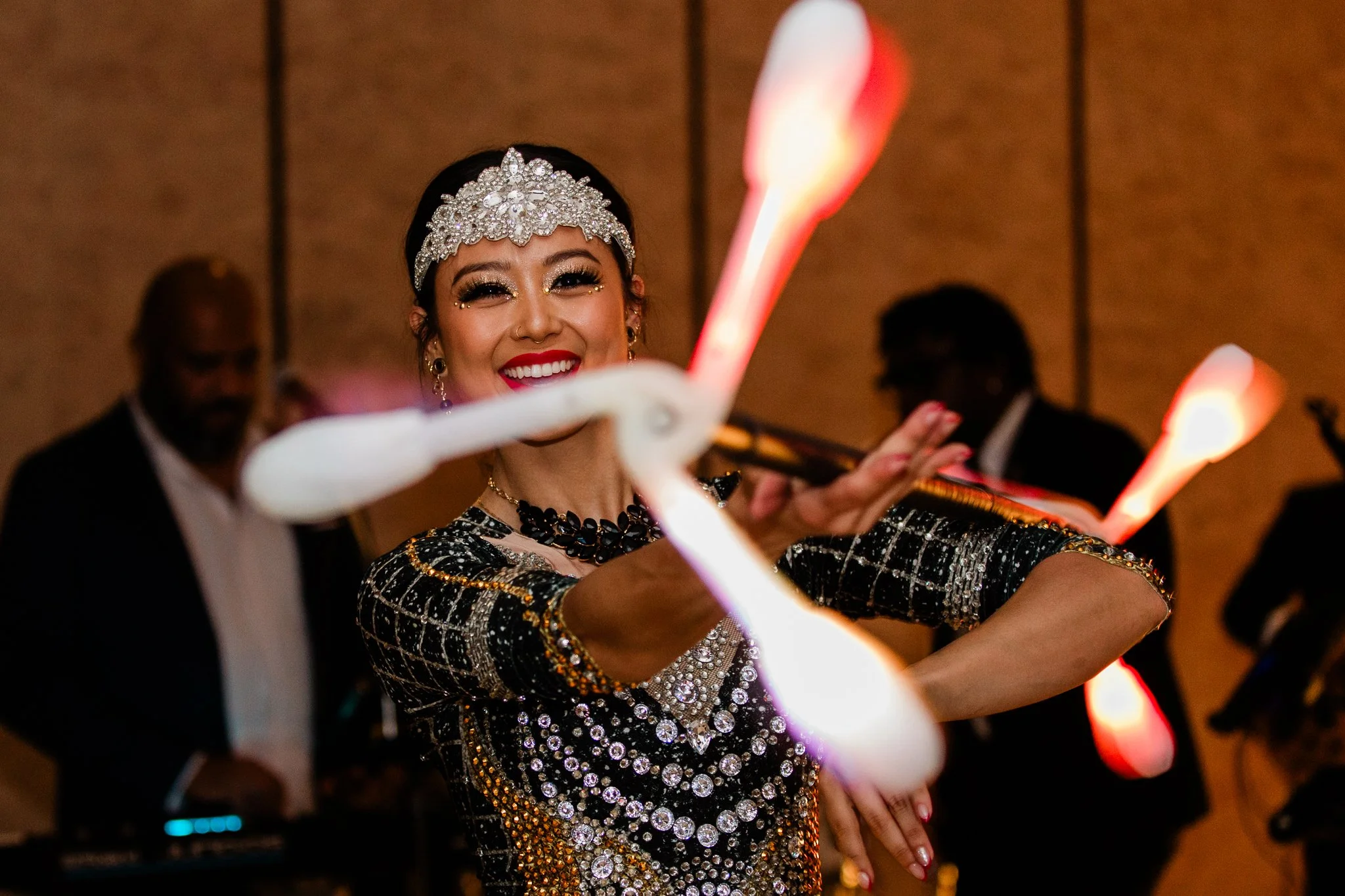 Roving LED performer entertaining guests at outdoor festival