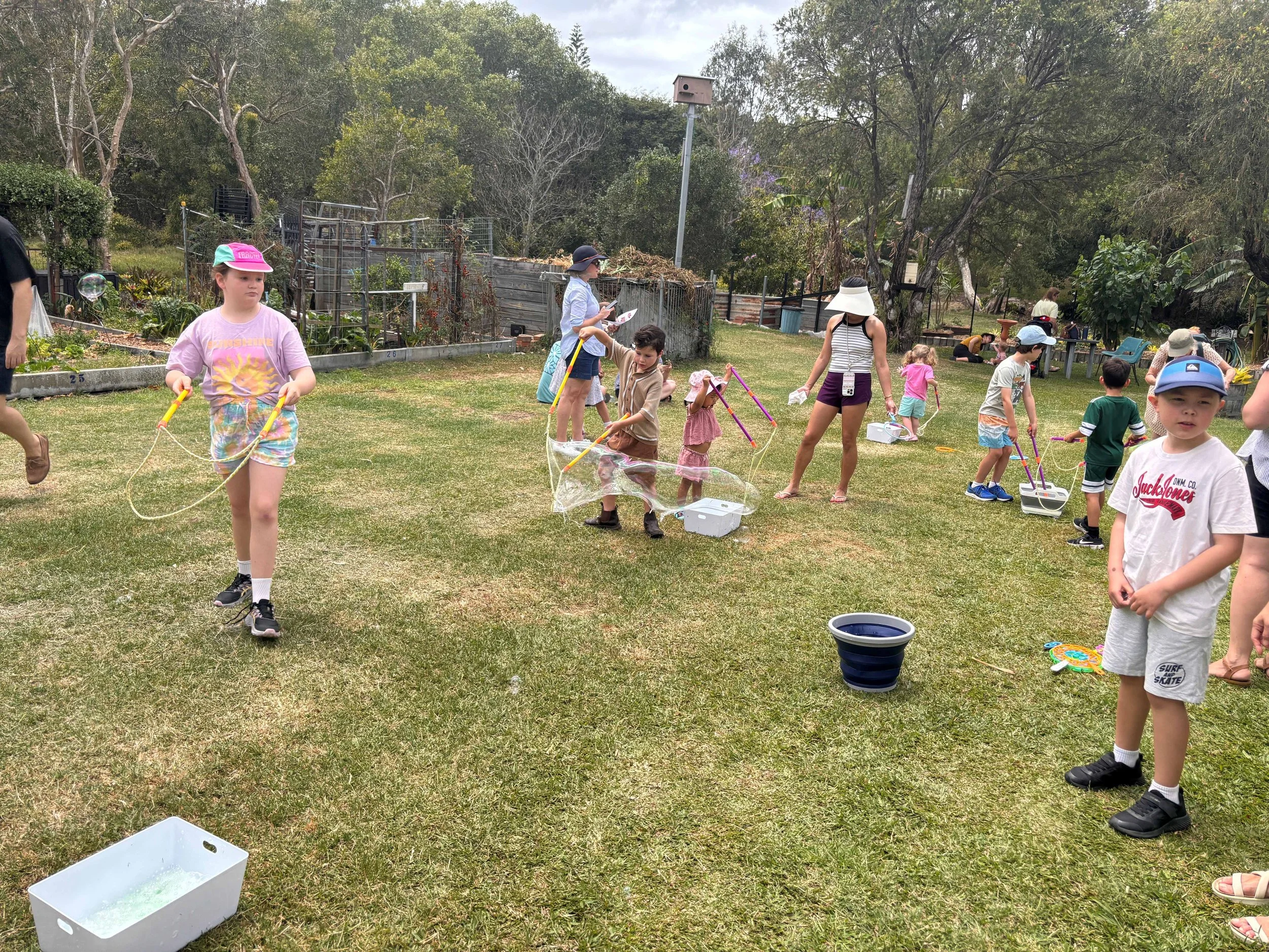 Kids making soap bubbles