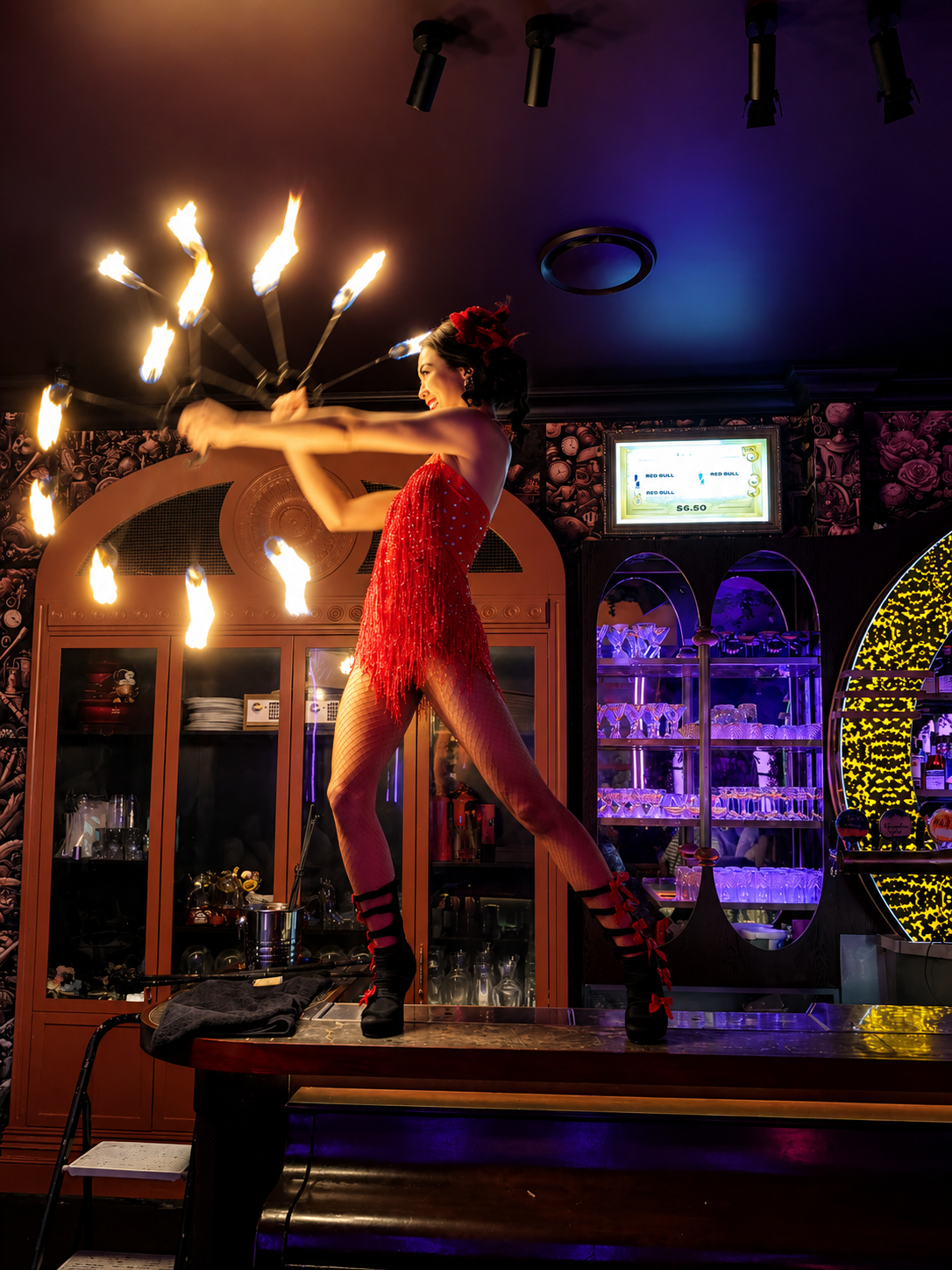 Fire twirler on top of bar nightclub Brisbane