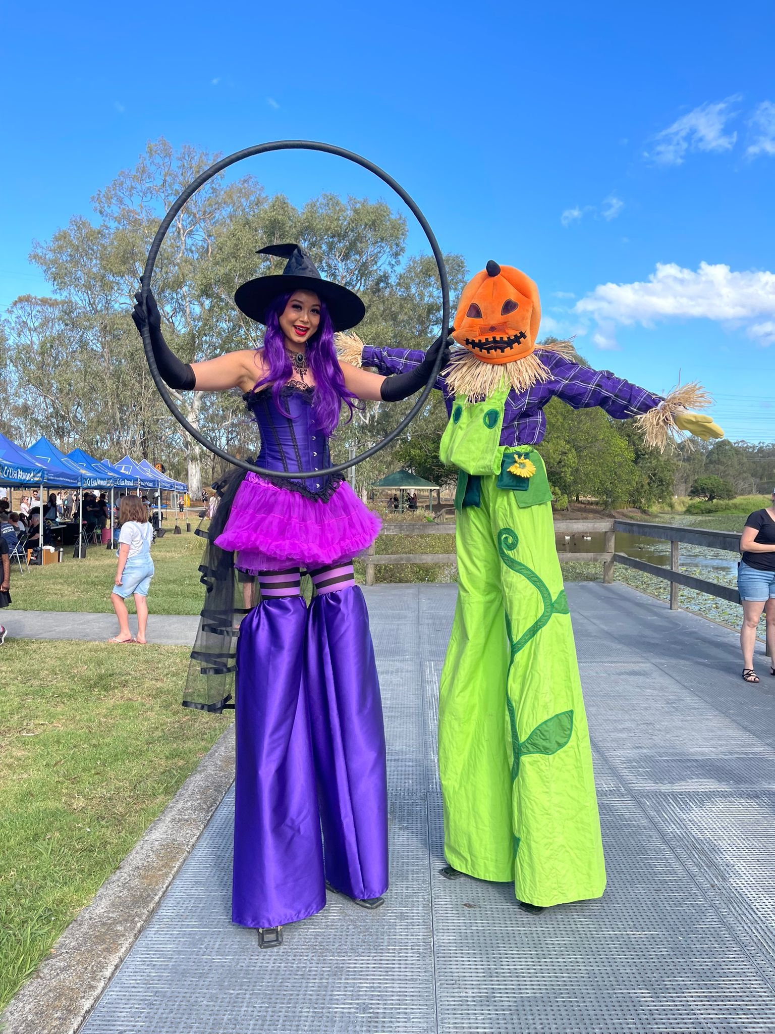 Halloween witch costume and scarecrow stilt walkers event entertainment Tingalpa