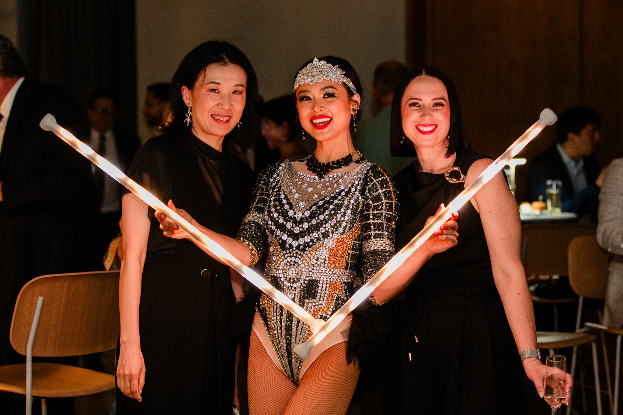 Light-up entertainer with glowing stick props