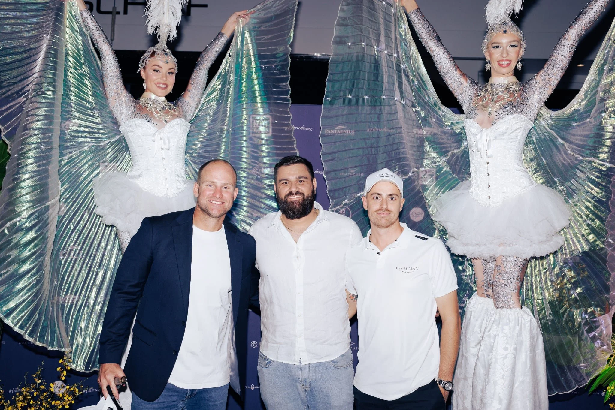 LED stilt performer with glowing wings for luxury event entertainment.