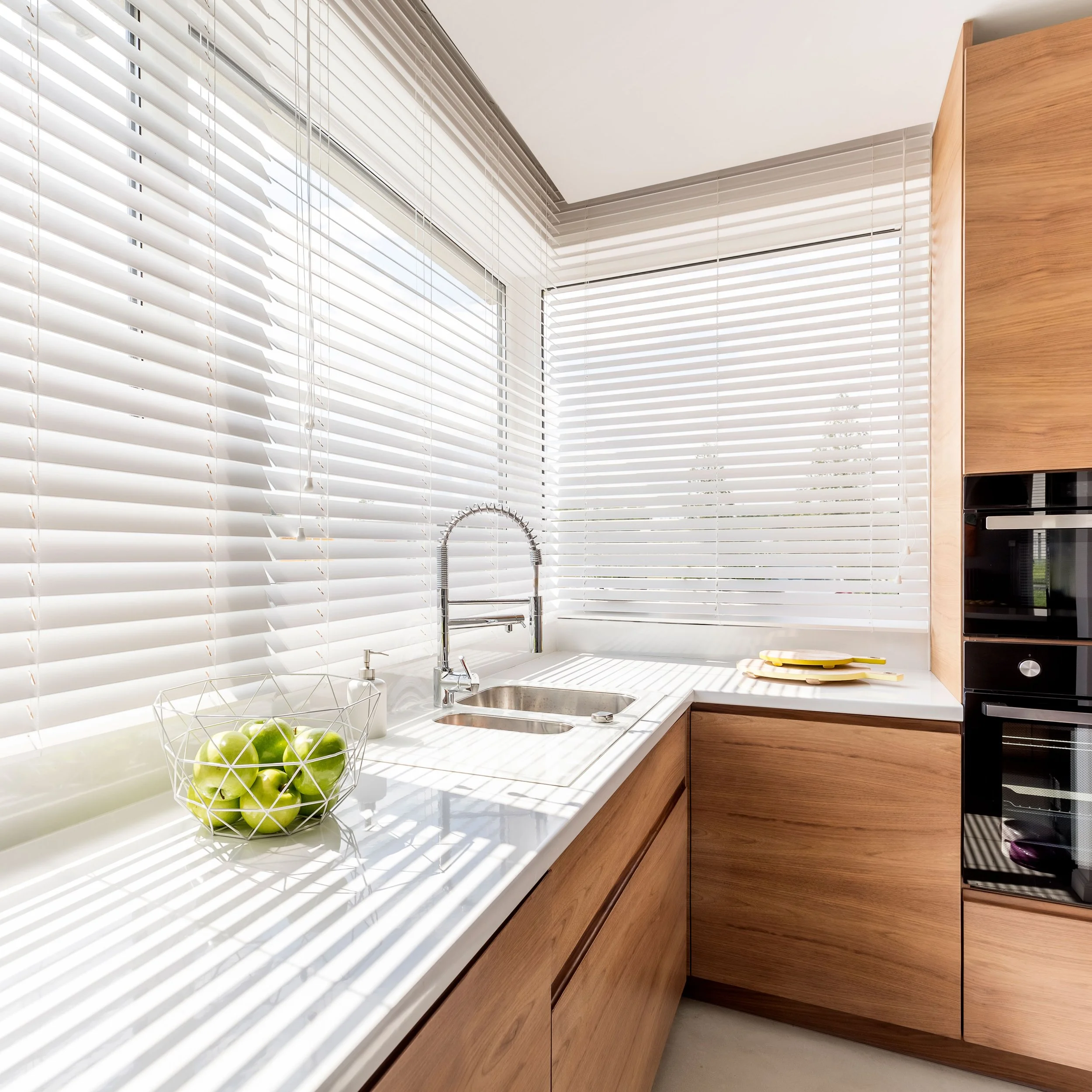 Aluminum binds over kitchen sink