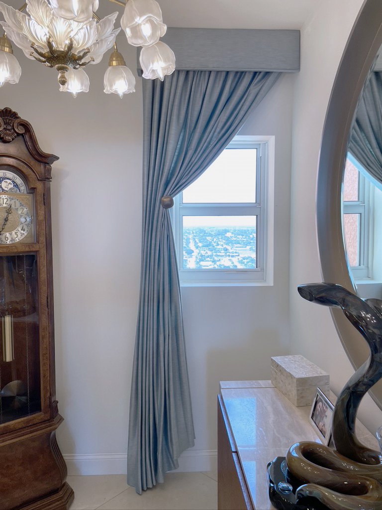 Blue window cornice in bedroom