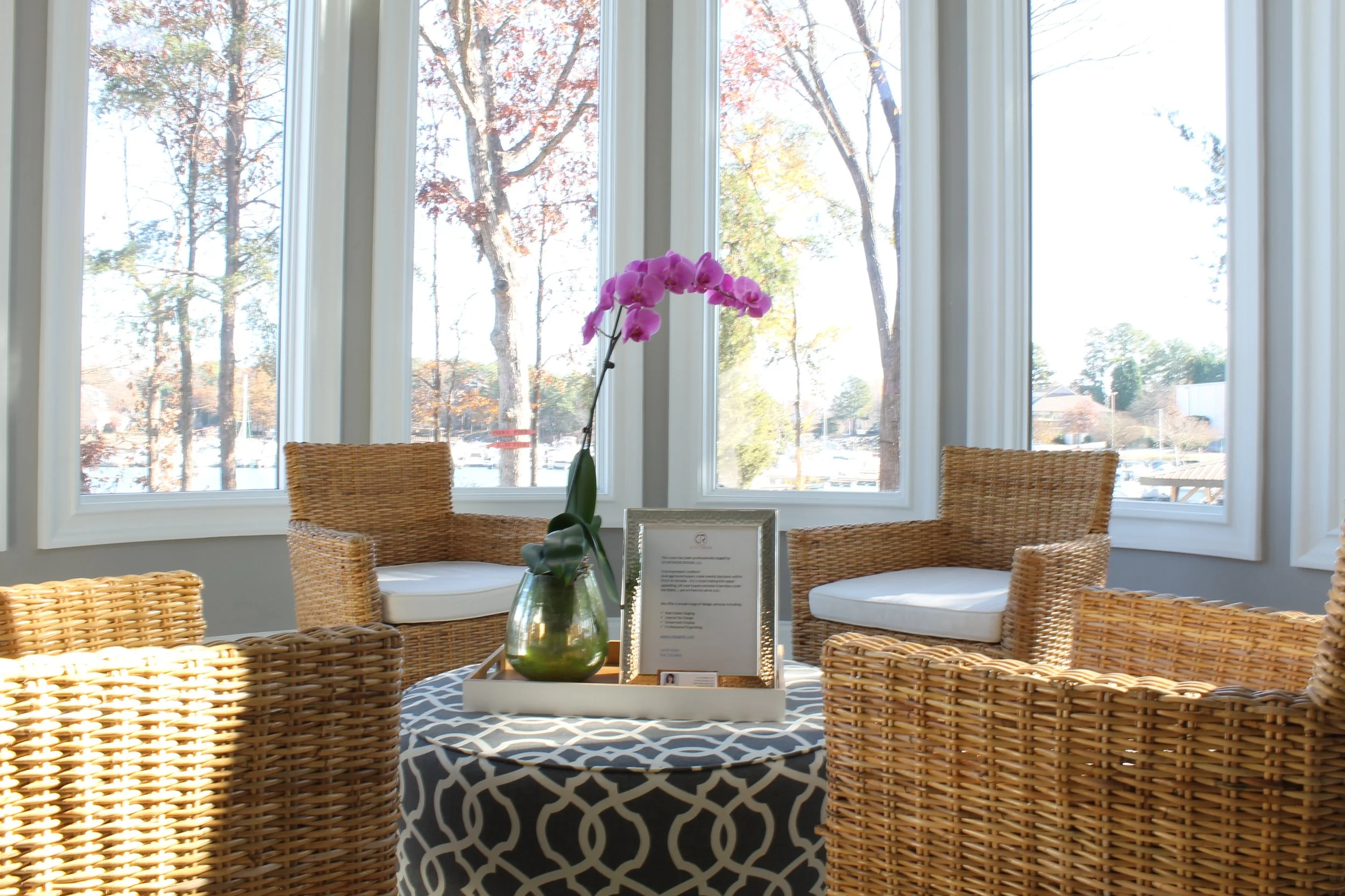 Sitting area with four chairs and an ottoman