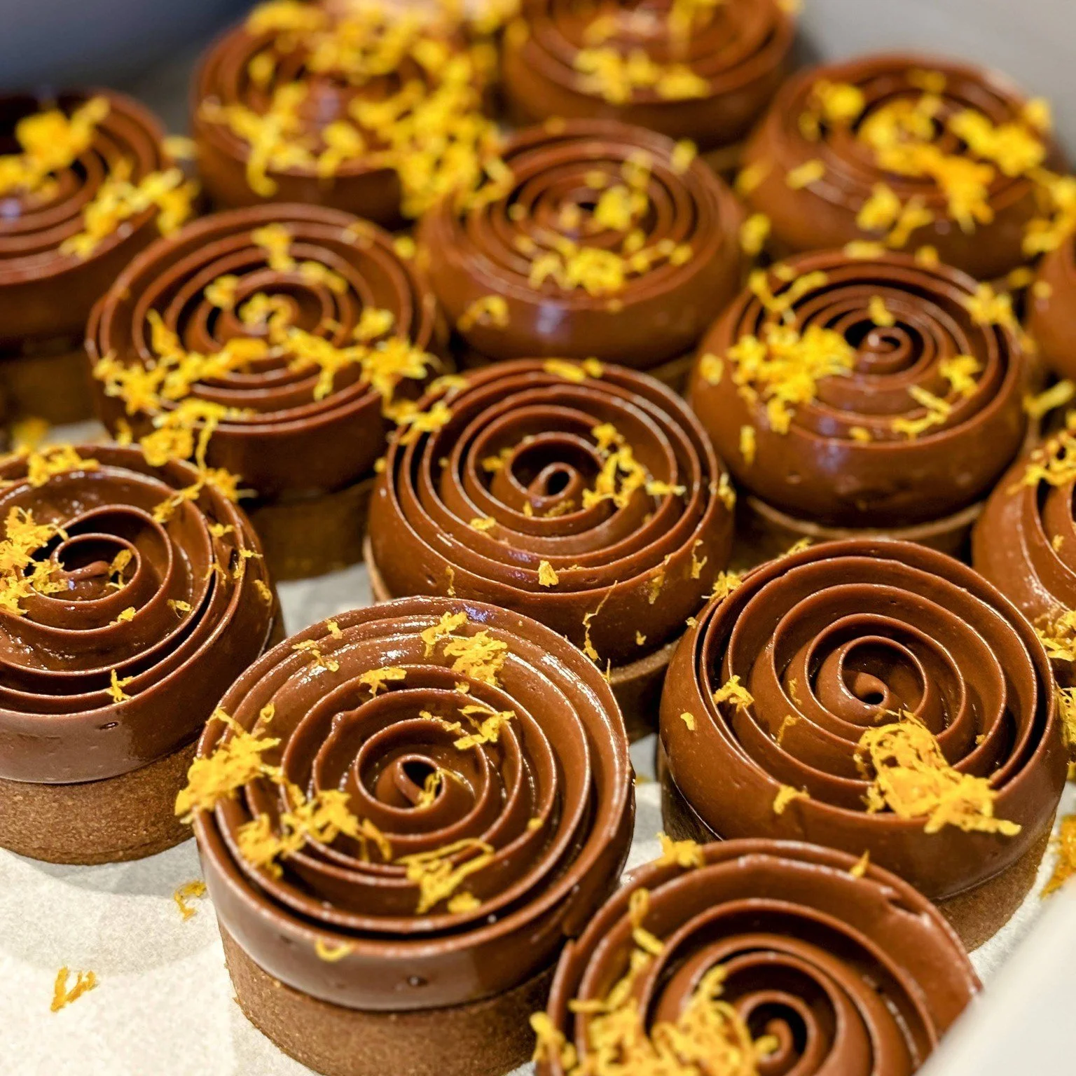 Chocolate Mandarin Tart 🍊🍫

A Hestia Patisserie CLASSIC returns this year in both individual portion sizes and a large sharing tart that serves 12-16 people! 🤤

Chocolate sable pastry case, mandarin jelly, set mandarin panna cotta, chocolate creme