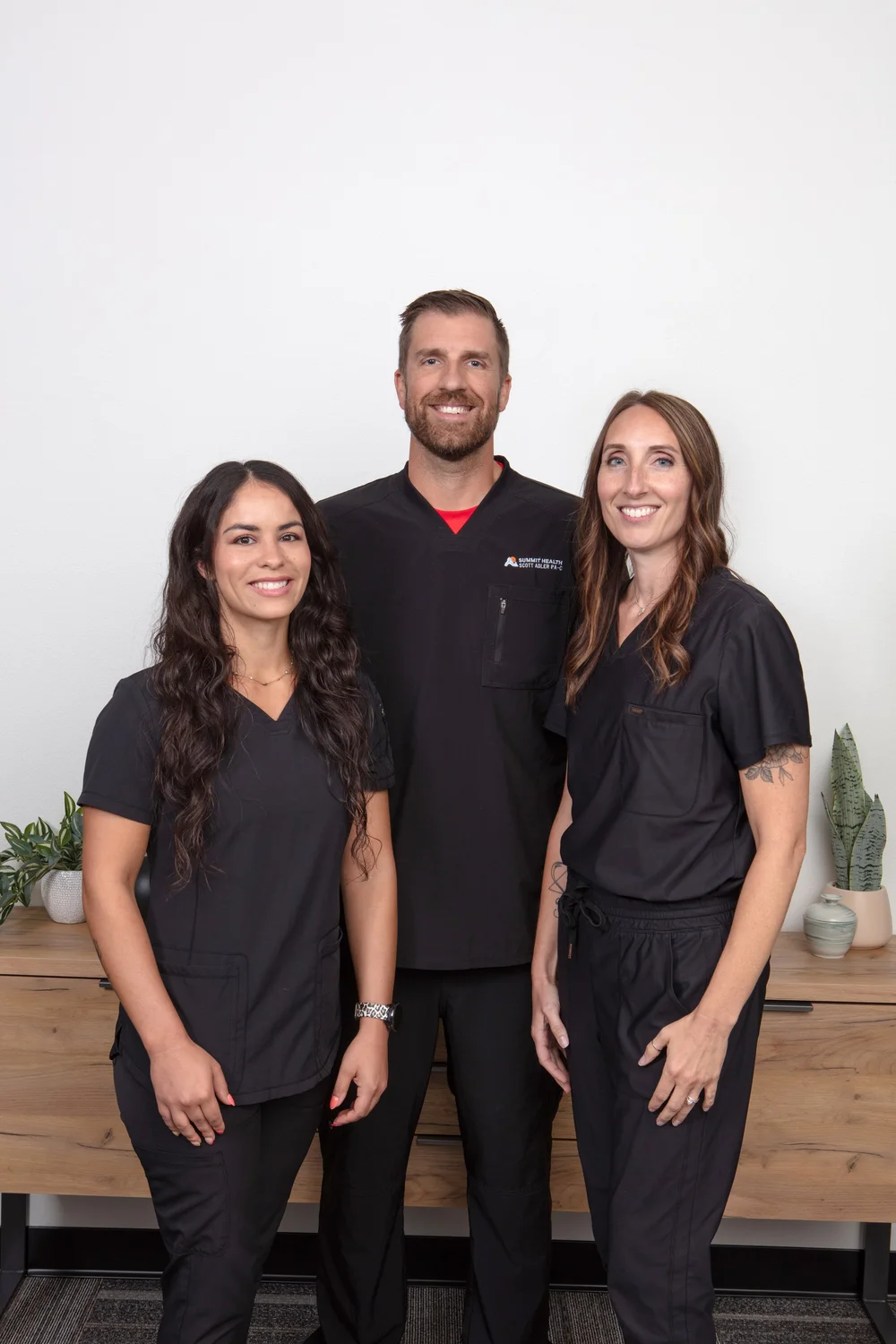 Scott Adler, PA-C with nurses Amber Tenorio and Melissa Bolin at Summit Health Clinic in Springfield, Missouri