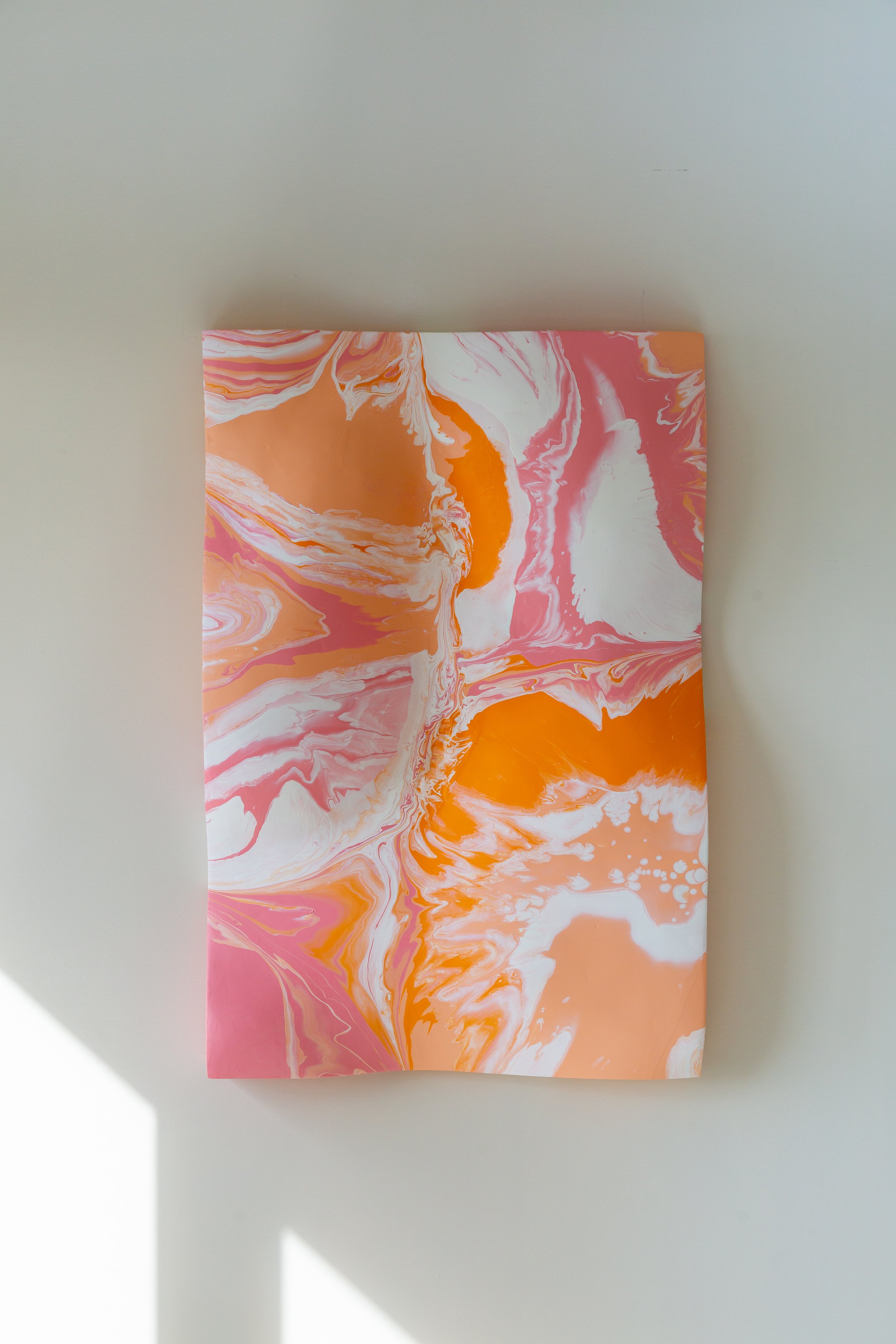 CRUSH: Original abstract artwork by Kayla K. Bohl, featuring vibrant shades of red and pink with dynamic textures and bold brushstrokes.
