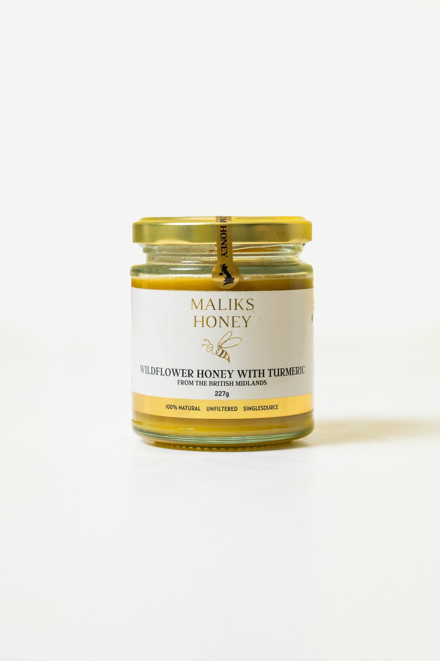 Maliks honey - honey with tumeric.jpeg