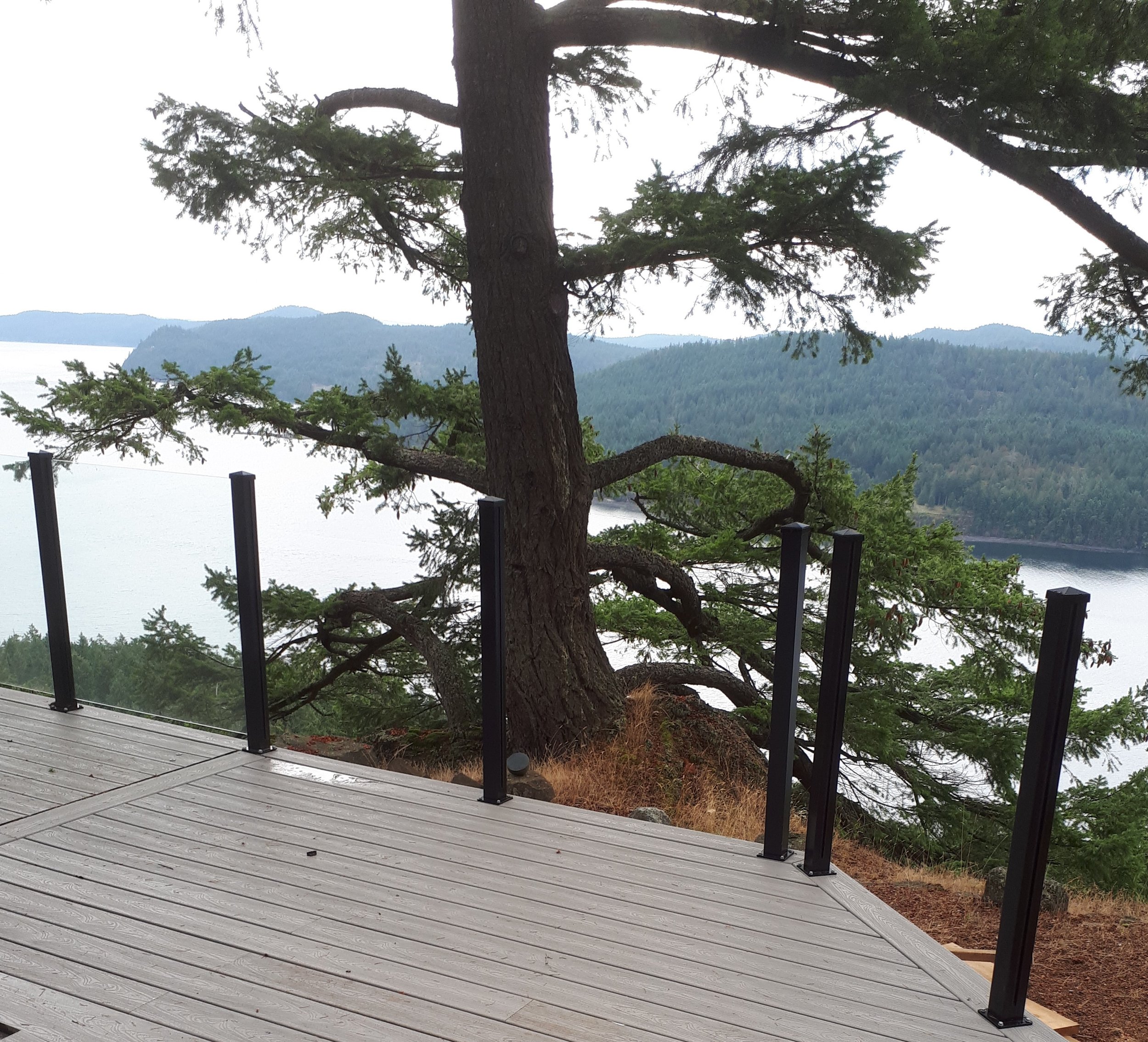 Composite decking with infinity glass railing