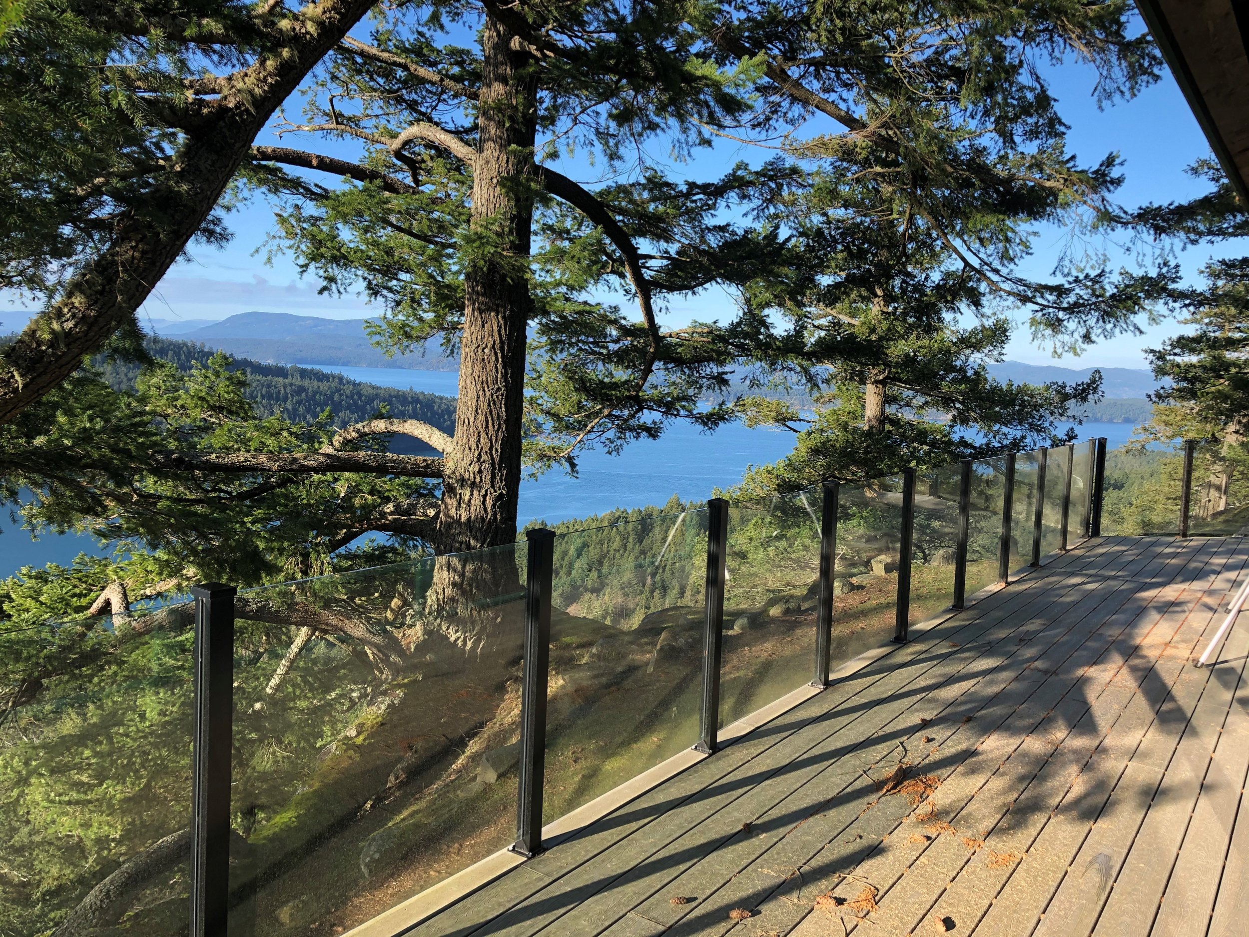 infinity glass railing on composite decking