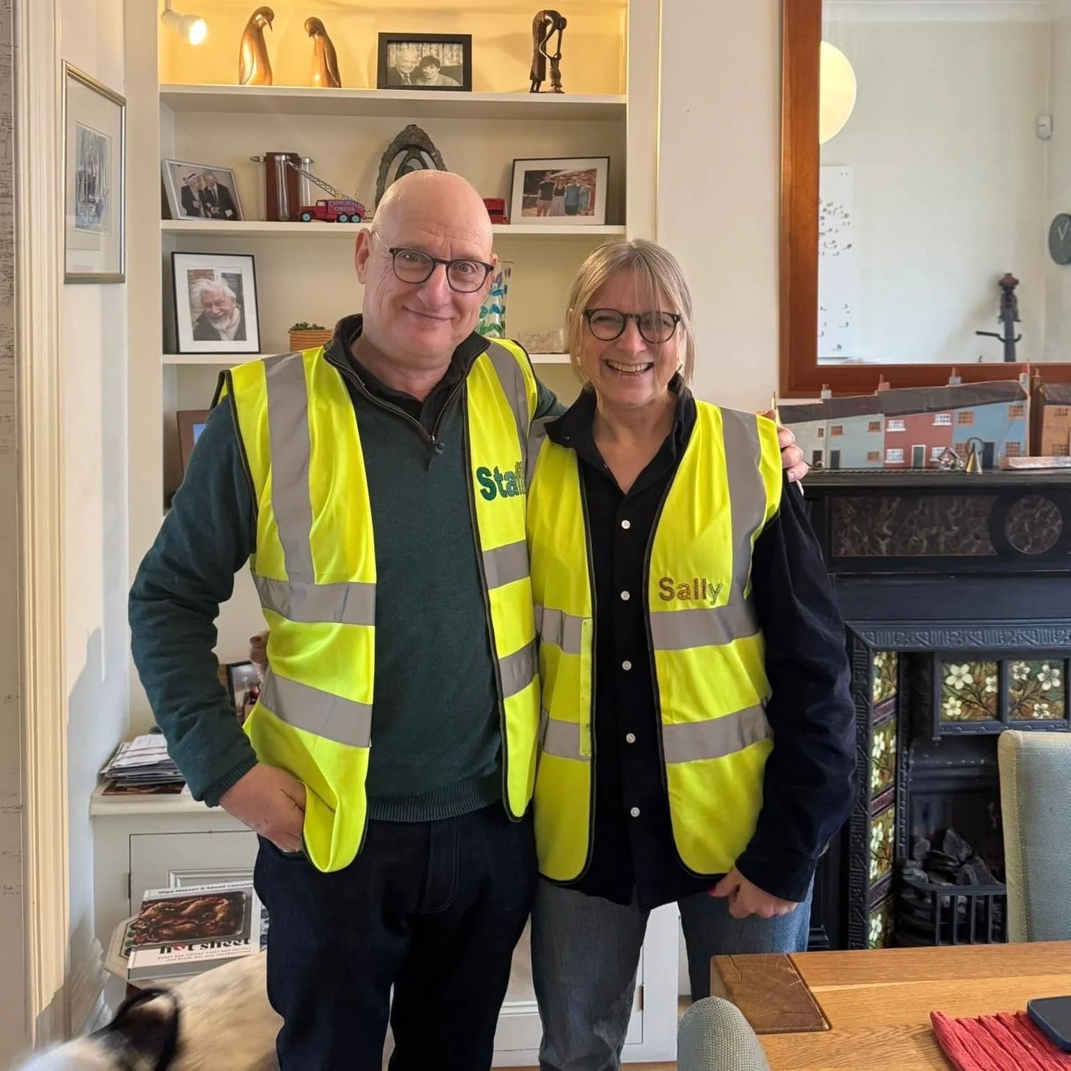 sally and andrew wearing branded hi-vis jackets
