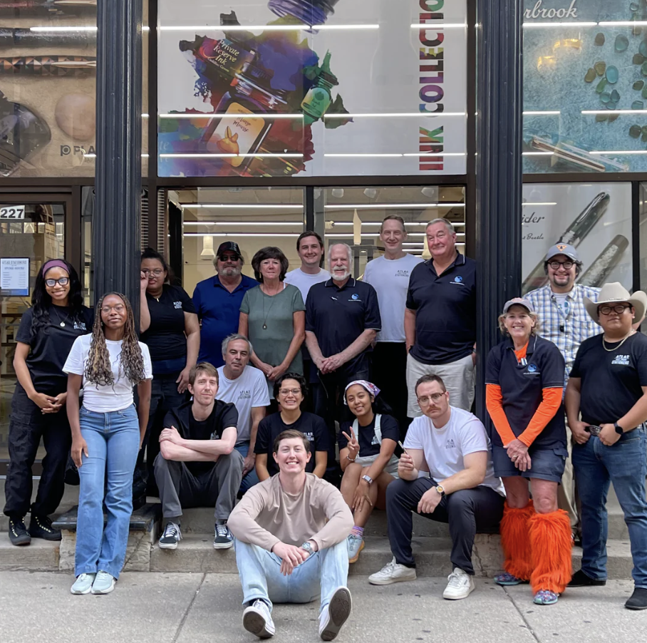 Photograph of Atlas Stationers team at annual sidewalk sale