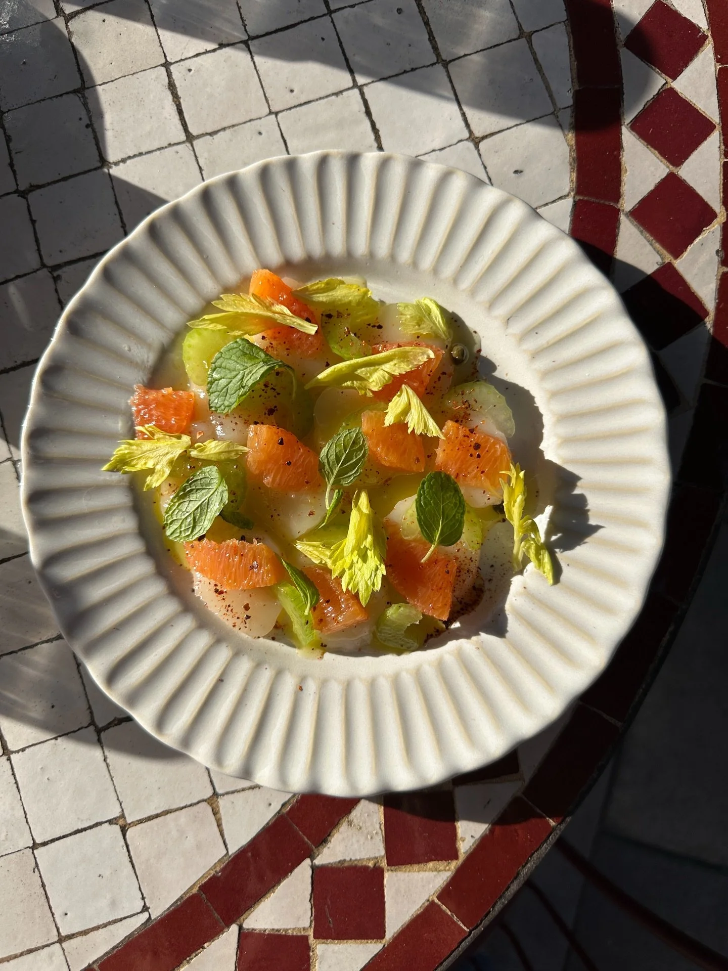 chef&rsquo;s new scallop crudo creation! cara cara orange, celery, mint, capers, calamansi vin. it&rsquo;s a sweet, salty, briny delight.