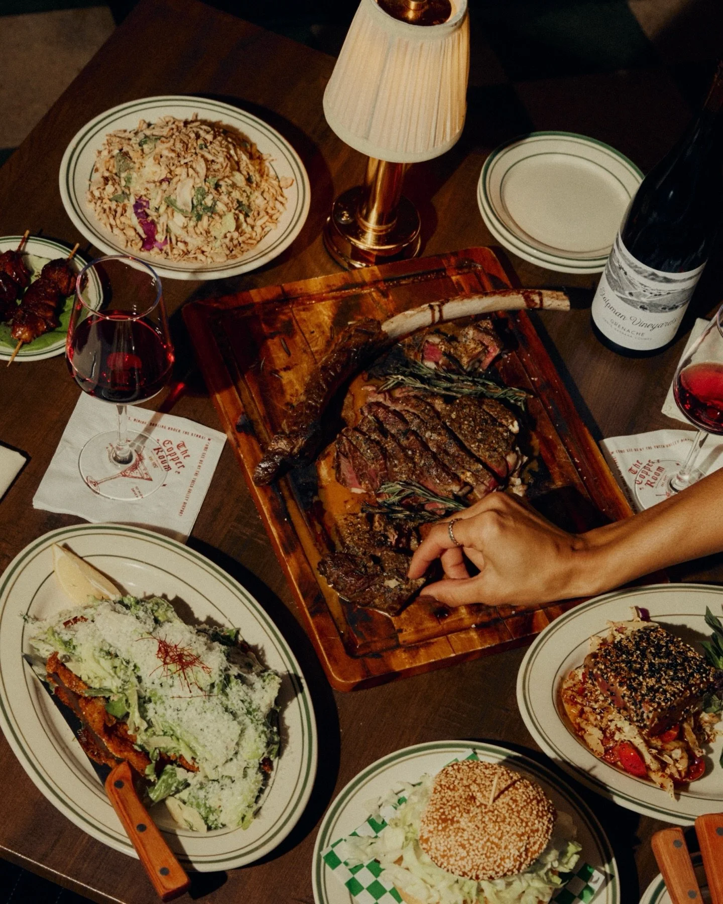 Good food doesn&rsquo;t happen by accident. A table full of plates made with quality and care &mdash; which one are you reaching for first? 🍽️

captured by @victoriaposhphotography
chef @philbronco 

#thecopperroom #highdesertdining #yuccavalley #de