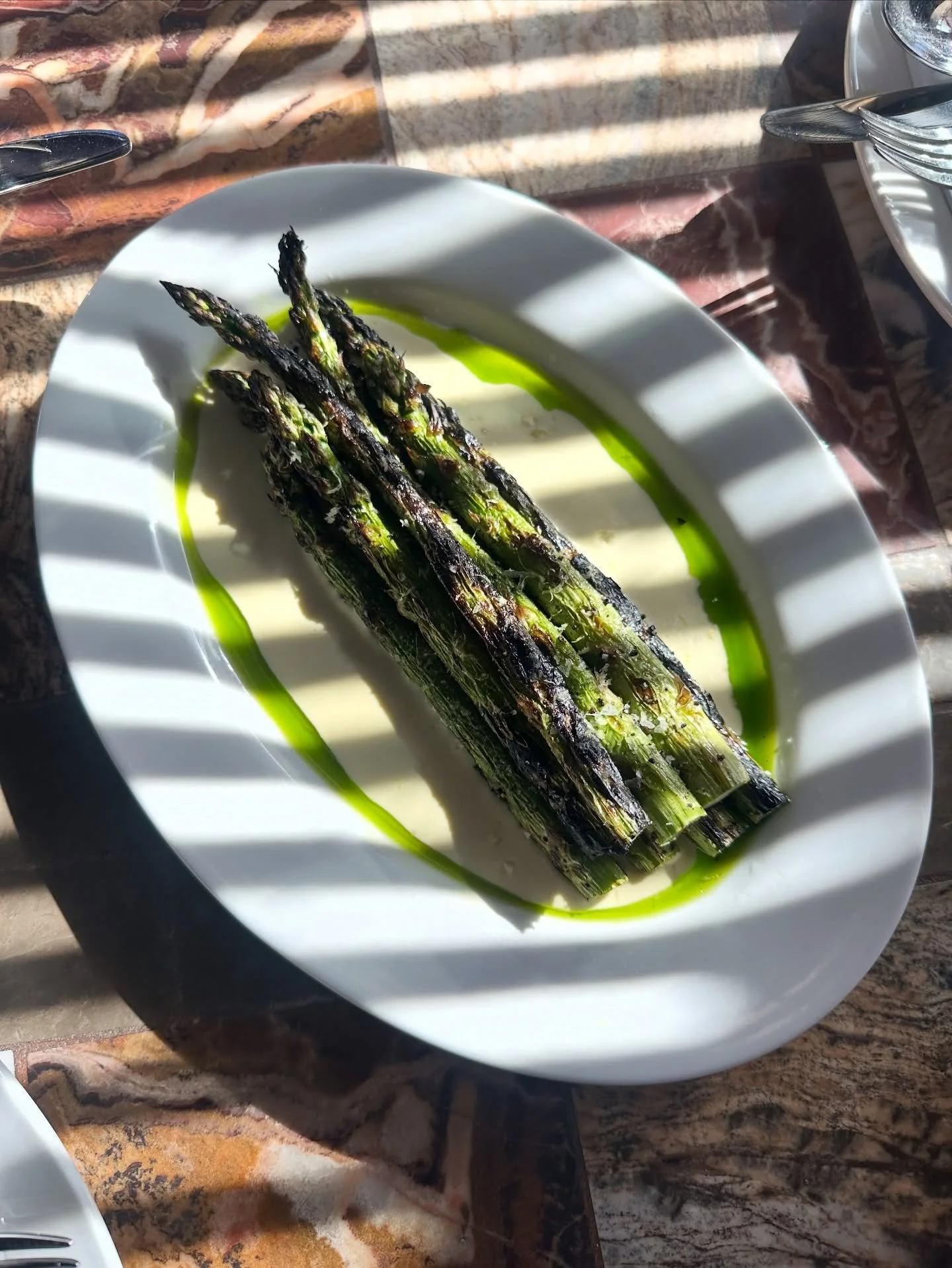 New veggie dish on the menu &mdash; charred asparagus w. ajo blanco &amp; lemon. We almost licked the plate clean when chef @dk_kolender let us try it!