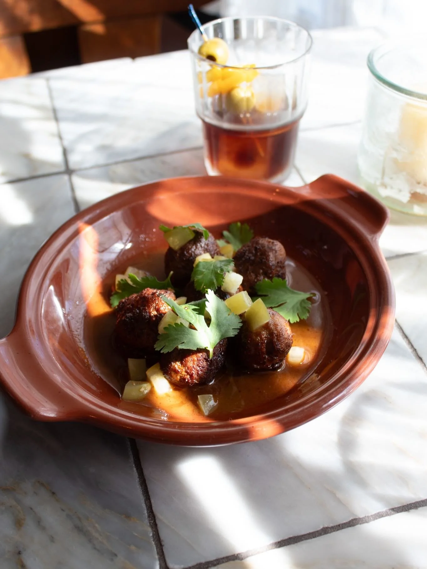 chef added this sleeper hit to the menu awhile back&mdash;lingui&ccedil;a spiced meatballs w. pickled tomatillo. highly recommend trying these lil unassuming guys!