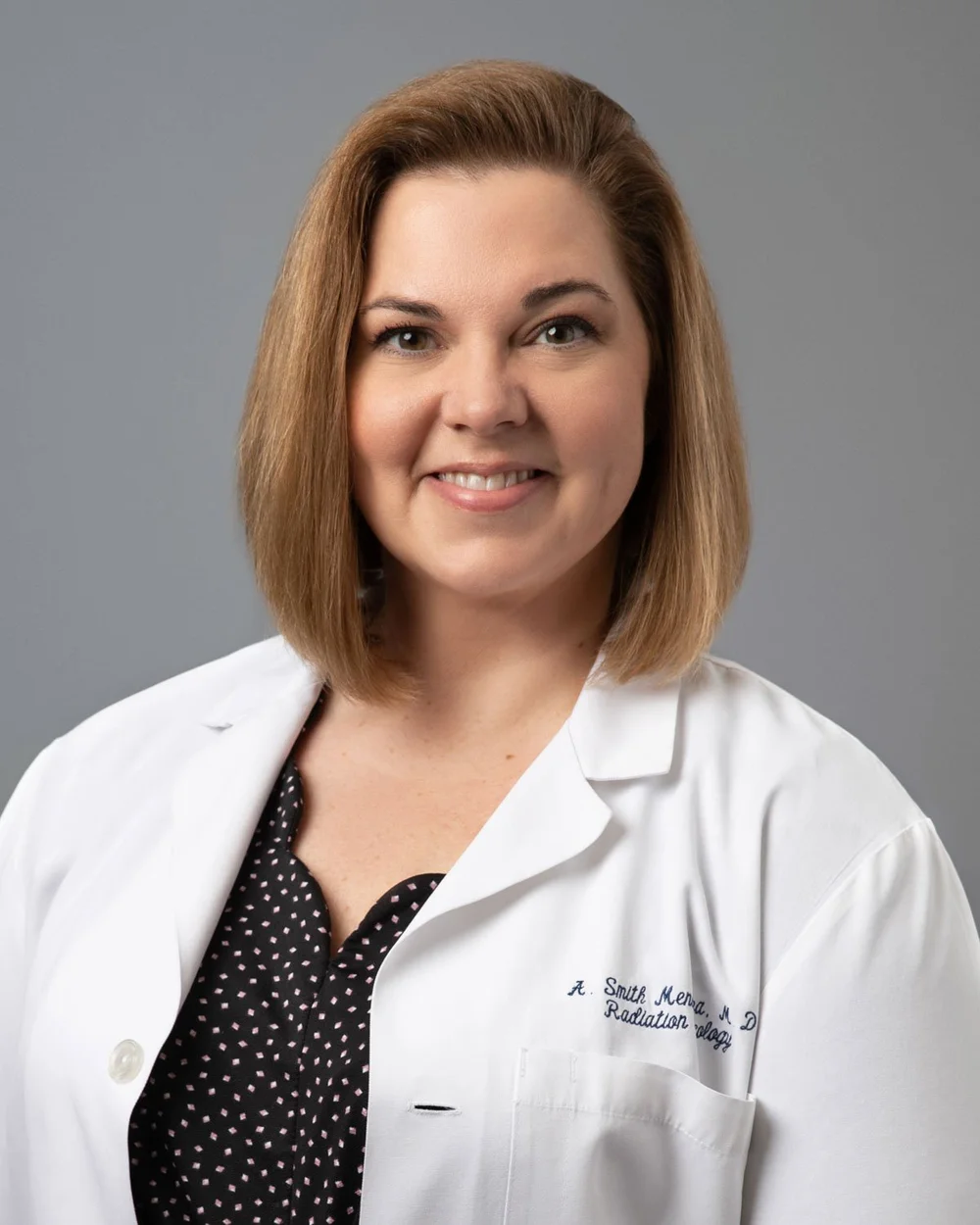 Dr. April Mendoza, MD Alliant Dermatology