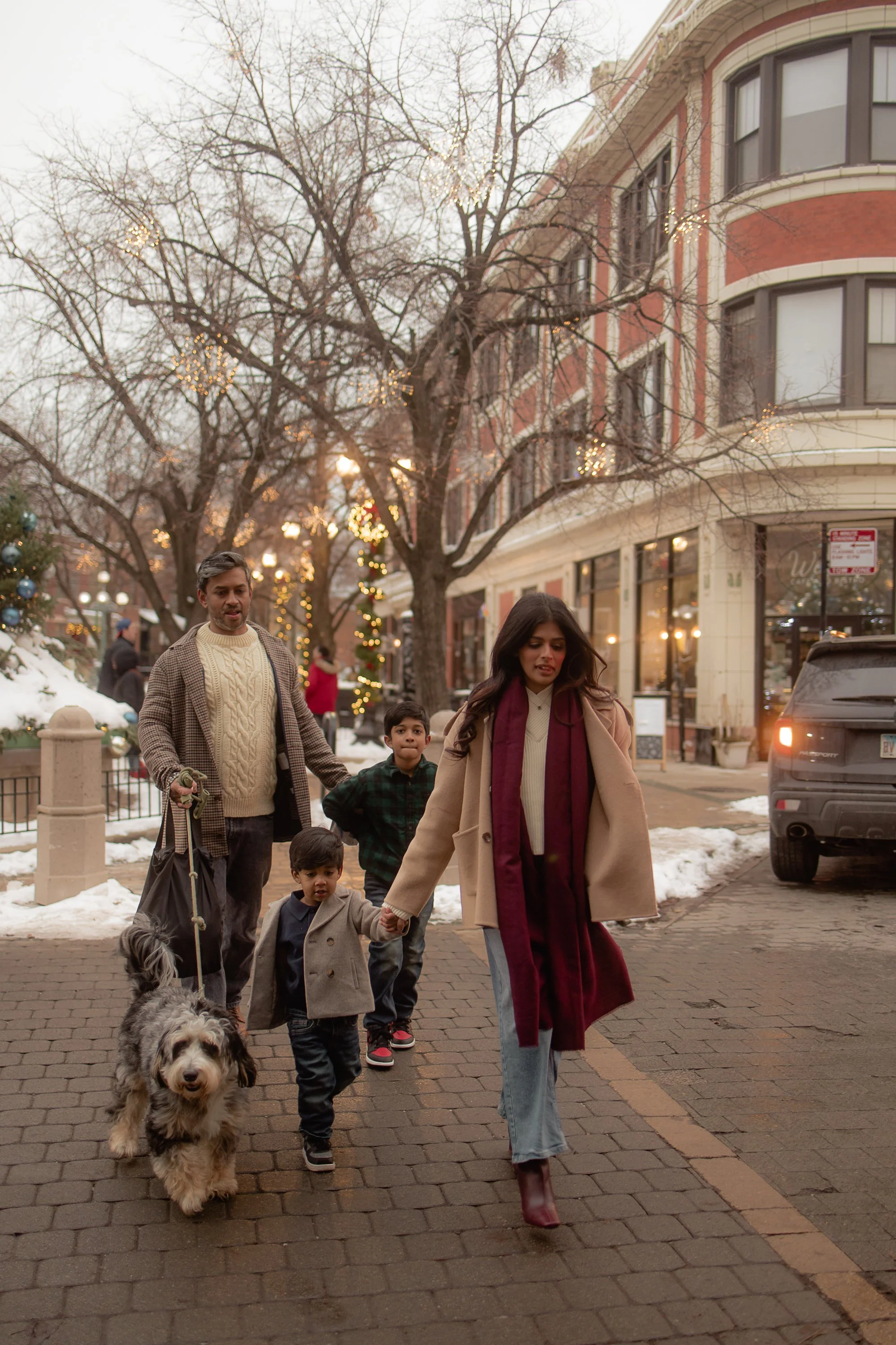 932A9900Nitya-Sharma-CHRISTMAS-AT-LINCOLN-SQUARE-SESSION-FAMILY-CHICAGO-ILLINOIS-RAVENSWOOD-DOCUMENTARY-PHOTOGRAPHY-BY-MARIA-RIVERA.jpg