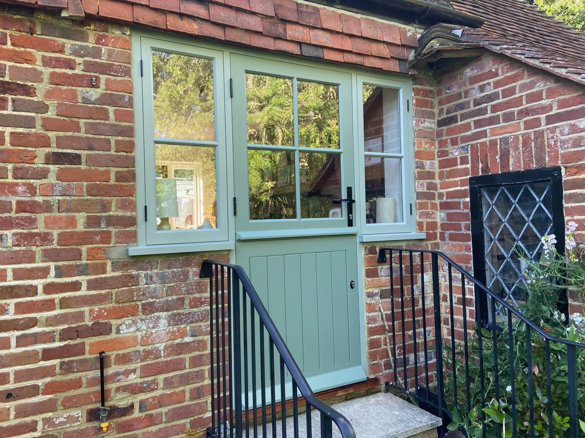 Painted hardwood stable door and sidelights