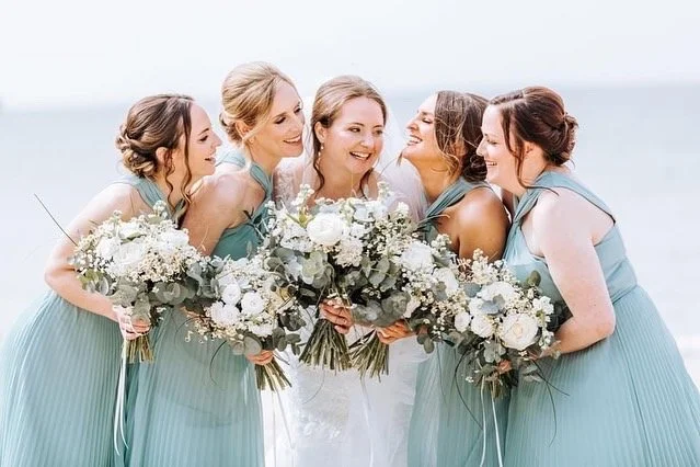 pale pink and green bridesmaids flowers
