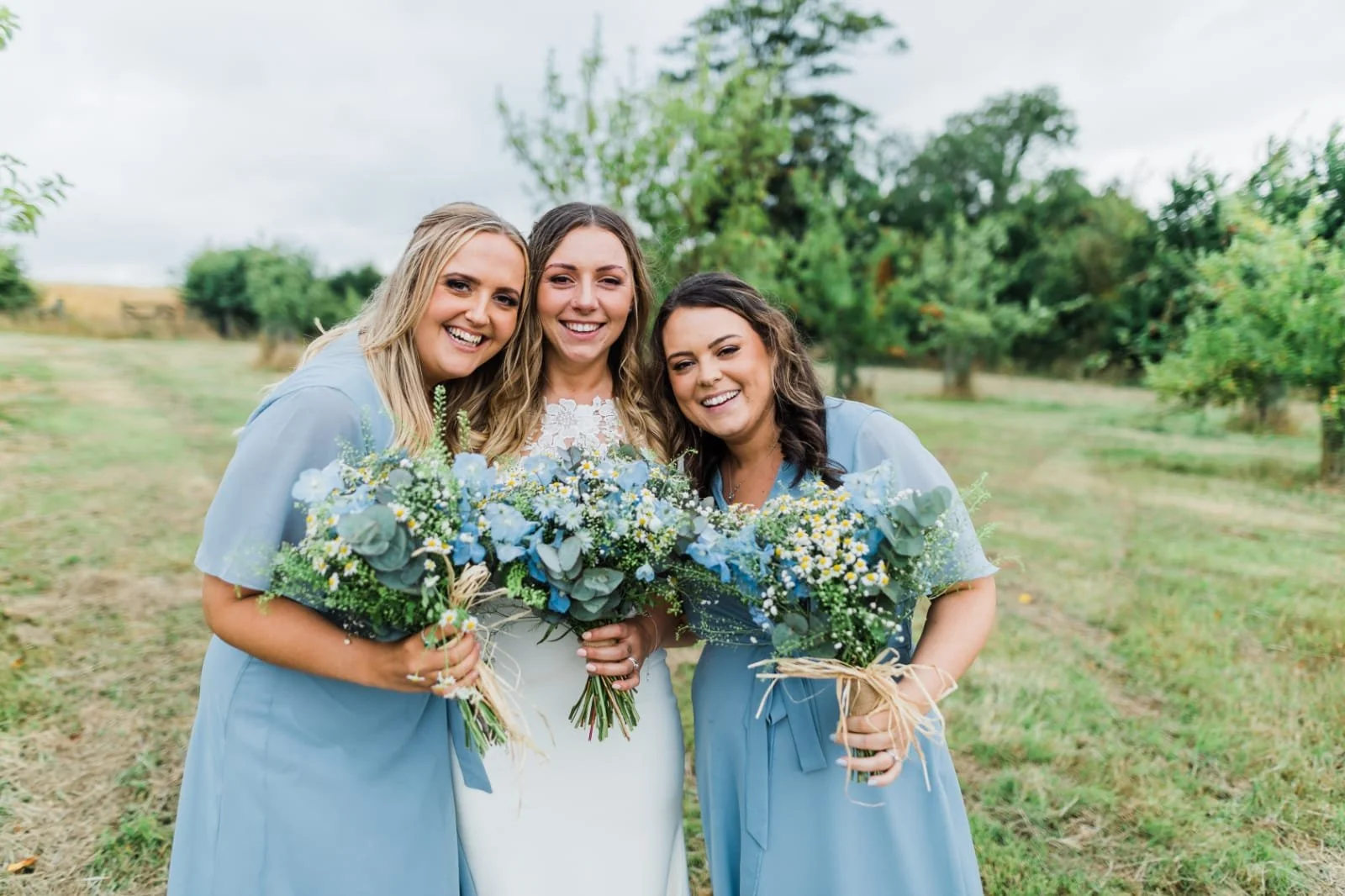 blue and green country wedding posies