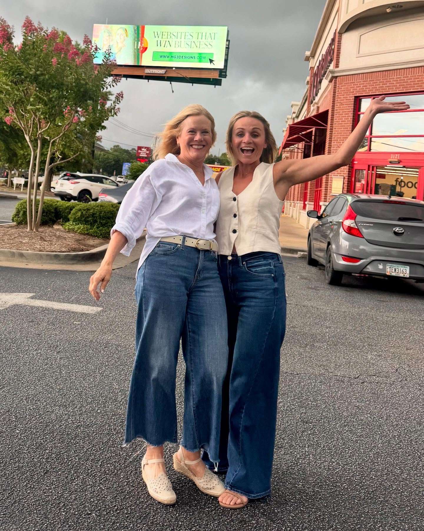 BILLBOARD BABES INCOMING 📣
(Not to be confused with Billboard Dad&mdash;real ones know.)

Mother Nature had other plans during our shoot&mdash;cue the surprise monsoon. But just like our websites, we don&rsquo;t quit when things get tough. Rain or s