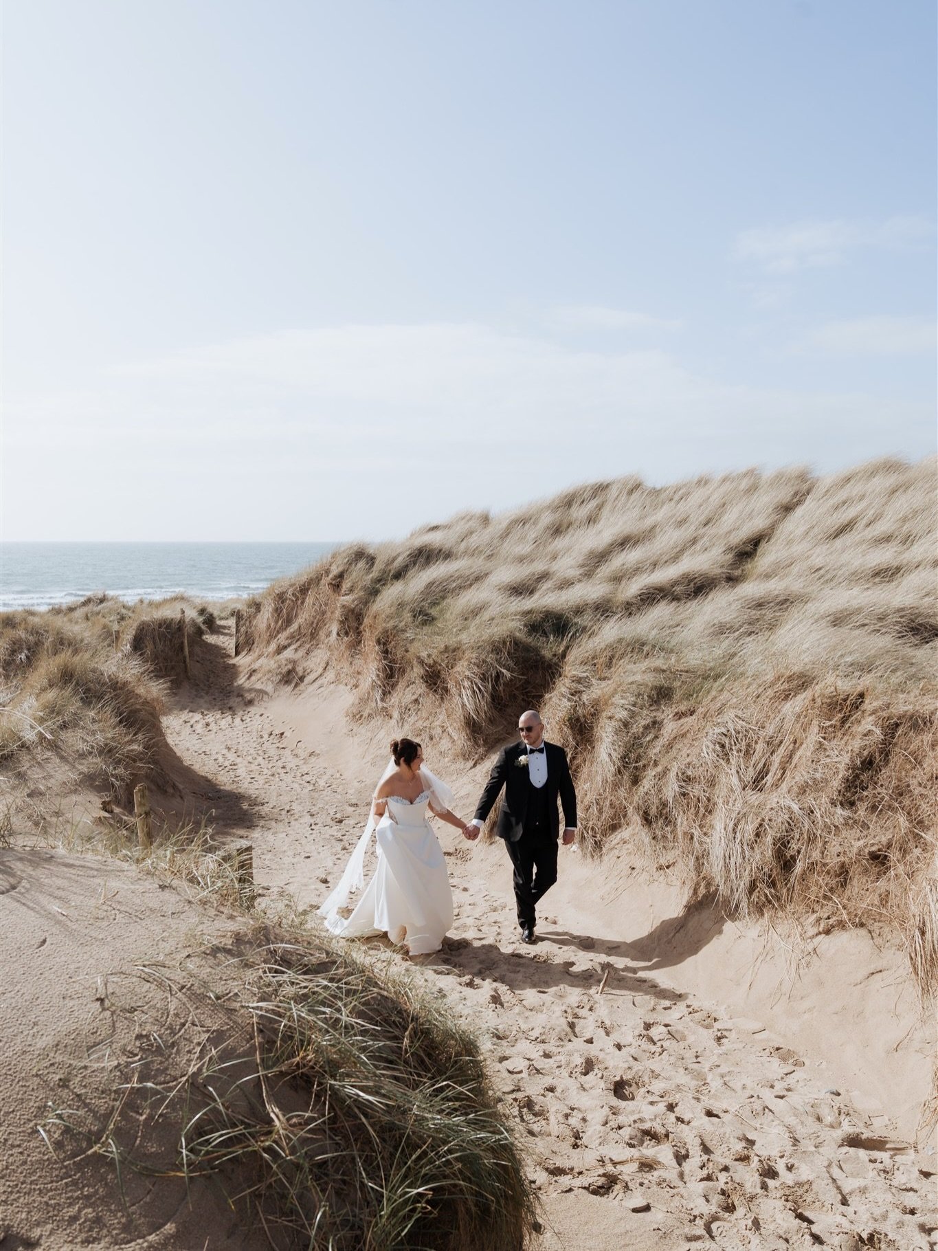 There&rsquo;s something about being by the sea&hellip;
everything feels calmer, slower, more intentional 🤍

the kind of day you don&rsquo;t just remember, you feel.

Bride + Groom: @courtneyaldcroft4 + @justmaaicwwl 
Videographer: @lr.filmss 
MUA + 