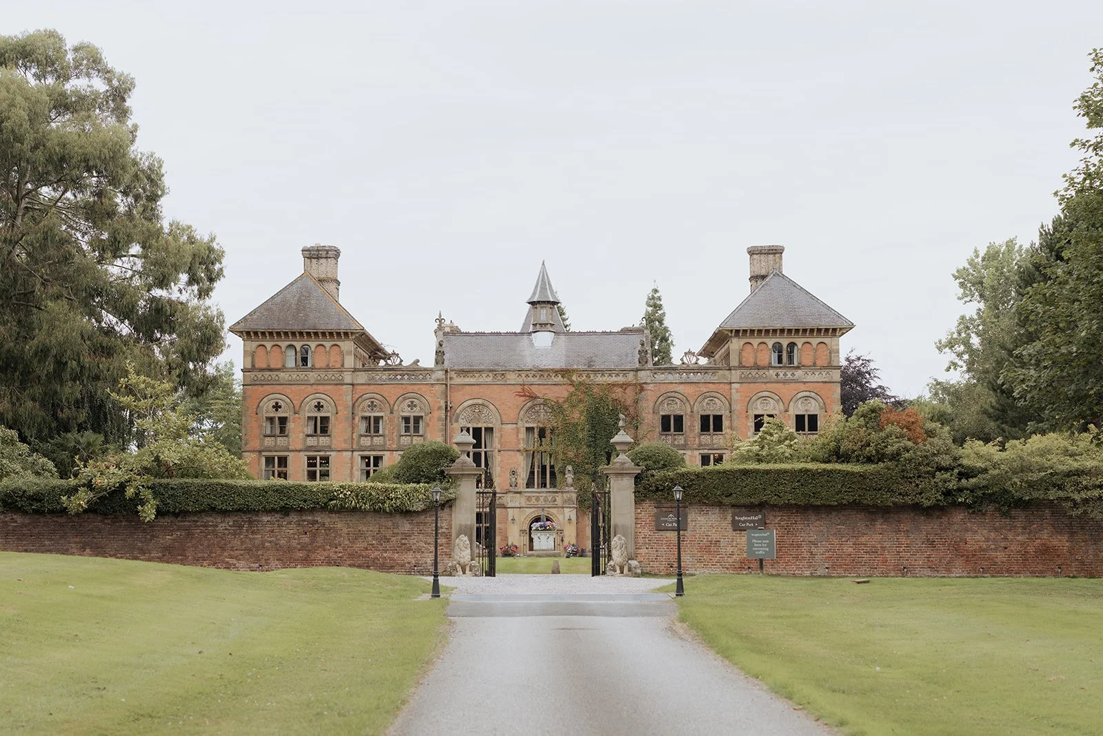Exterior view of Soughton Hall wedding venue in Cheshire, photographed in a soft, editorial style