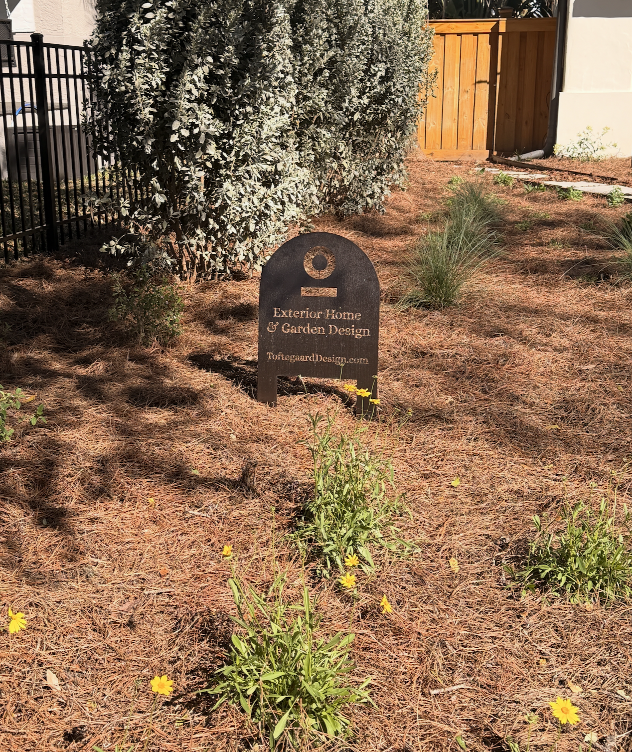 Front yard landscape transformation, curb appeal, seasonal flowers, florida native plants, pine straw, ground-cover, toftegaard design